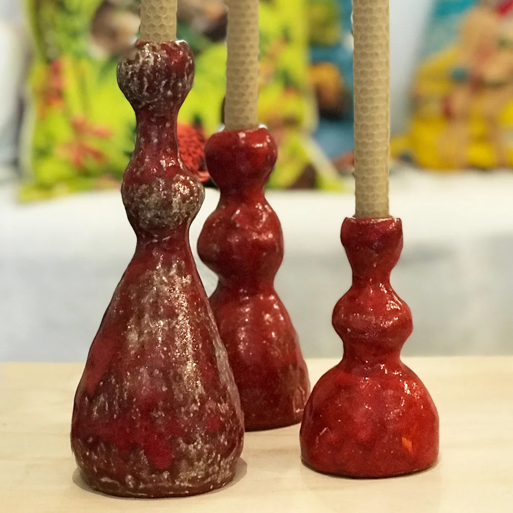 Red candle holders approx 70mm diameter x 130-200mm high