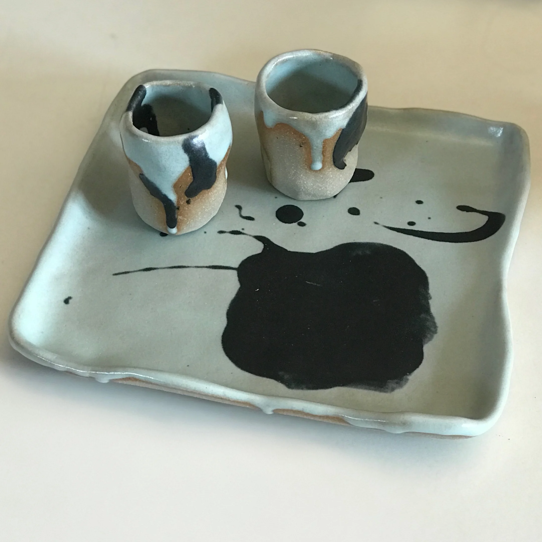 Hand painted cups approx 55mm diameter x 70mm, platter approx 220mm x 220mm x 30mm