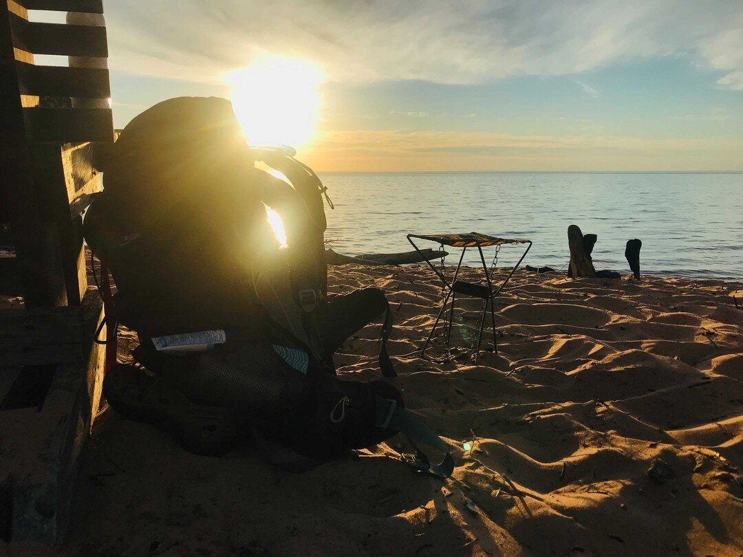 A full pack makes a great backrest to watch the sunset with. We love summer.