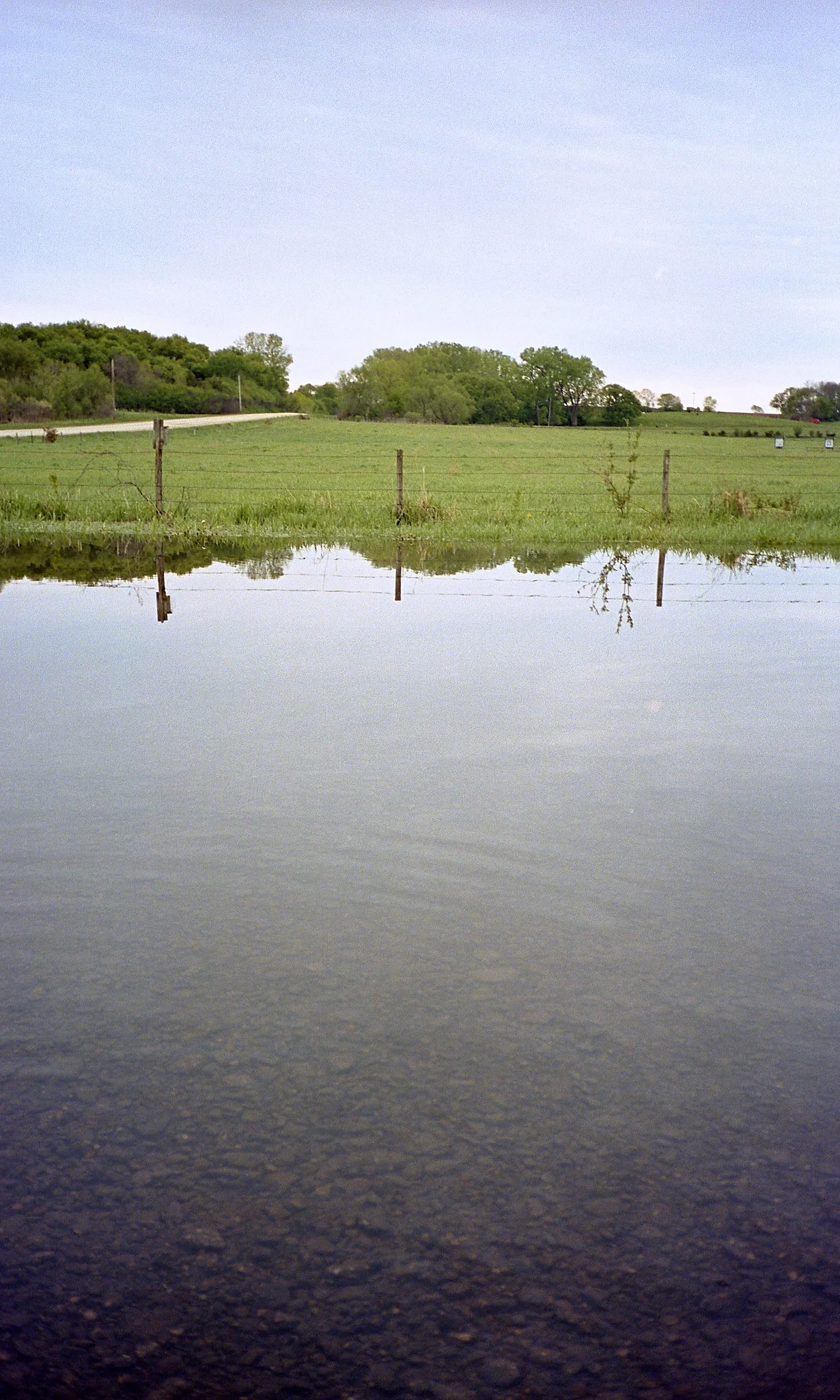Kodak Portra 400, parking lot of the place above after a lot of rain.