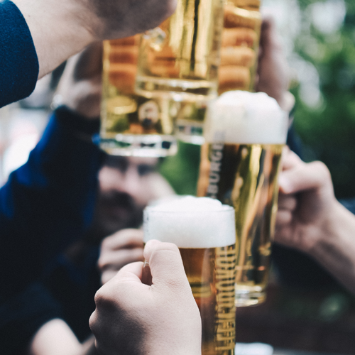 american-brewery-history-cheers-with-steins.png