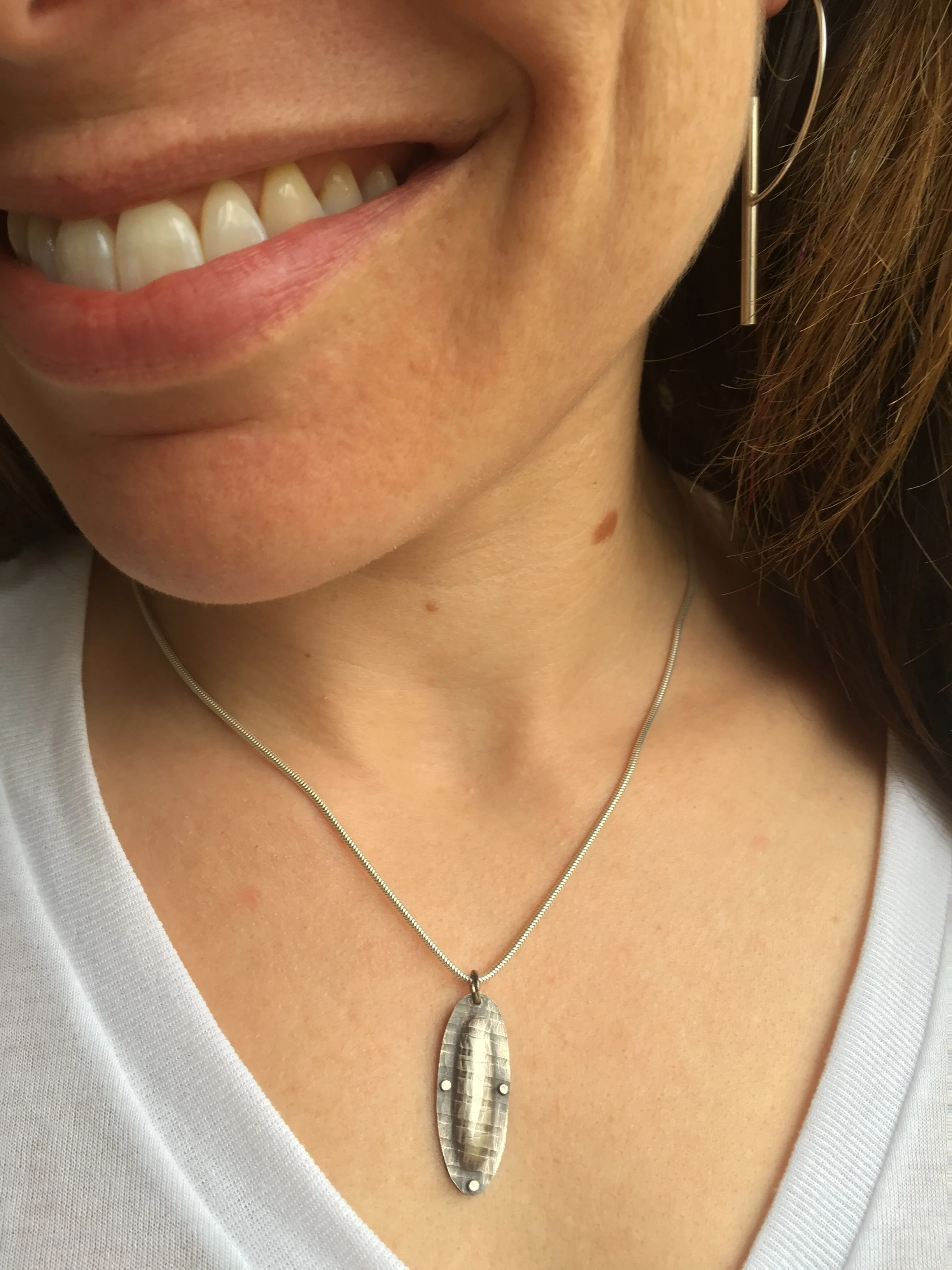 Riveted Pod necklace