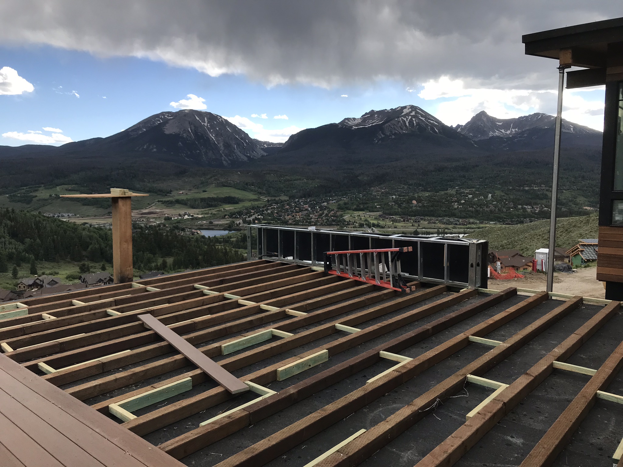 The metal structure behind the ladder is the outdoor linear firepit