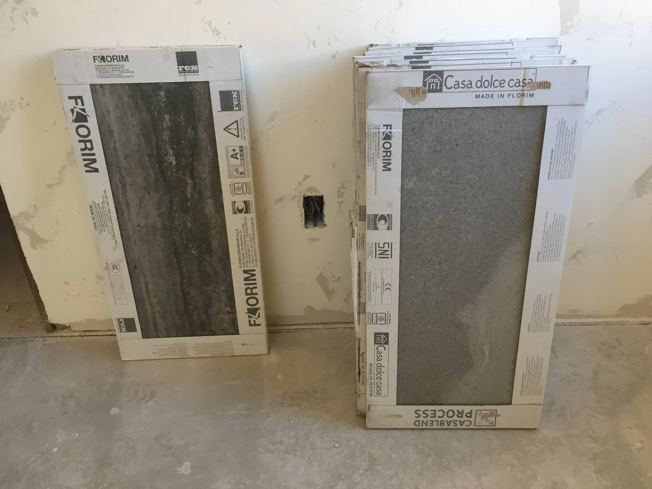 Floor tile (left) and shower field tile (right) for the main guest suite.