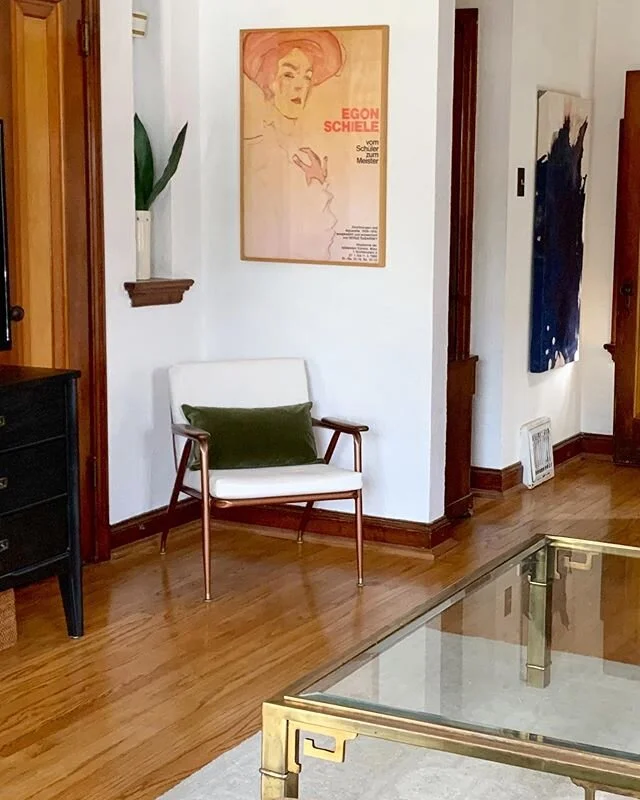nice little nook 🖼🌿 our house is a balance of modern and heirloom, and two of my favorite adopted items are in this shot &ndash; a 1970 mastercraft coffee table from my grandpa, and a 1984 Egon Schiele original art show poster from my dad. both of 