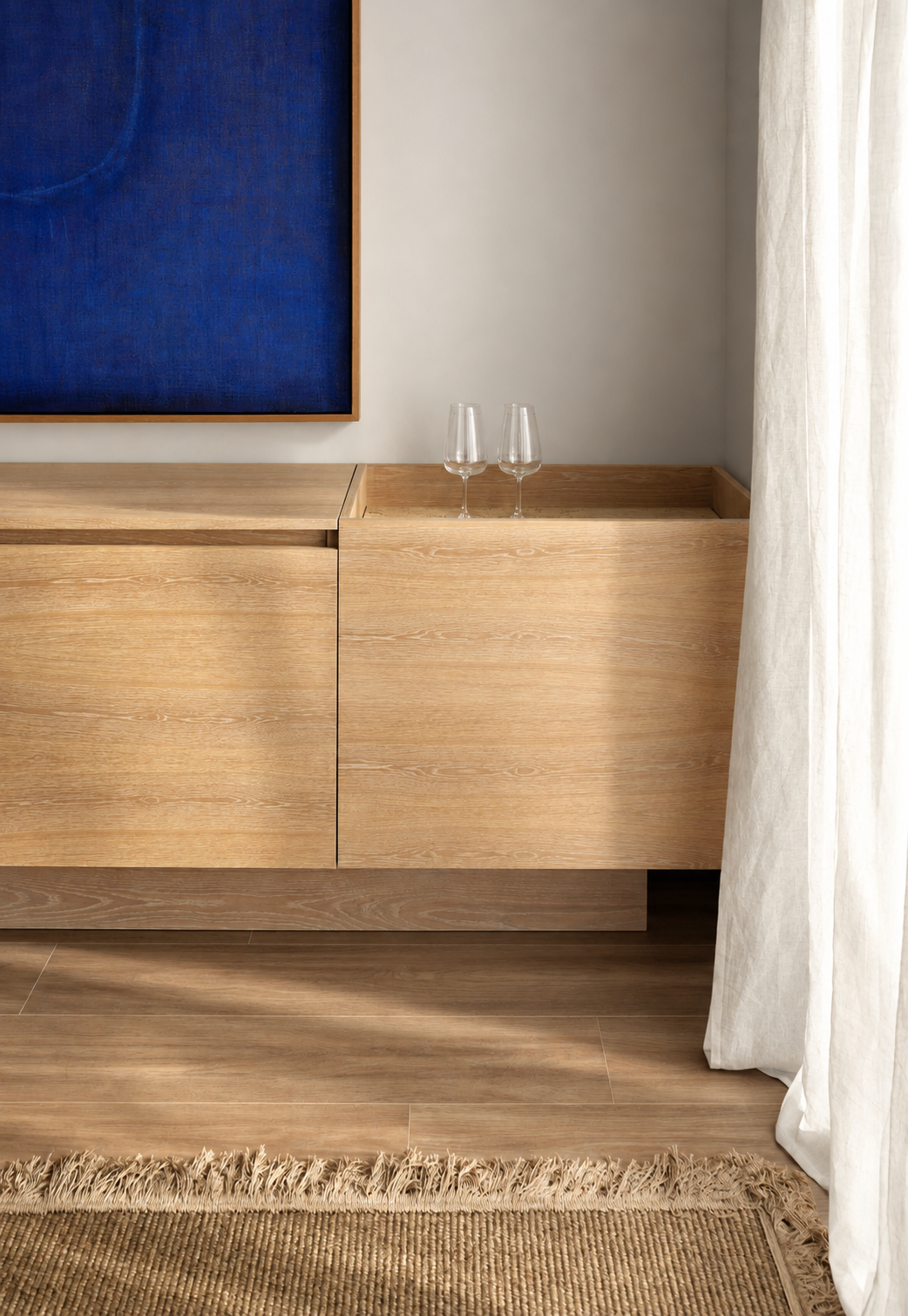 quinta-do-pinhao-sala-de-jantar-design-interiores_Sunlit Minimalist Cabinet with Blue Art.png
