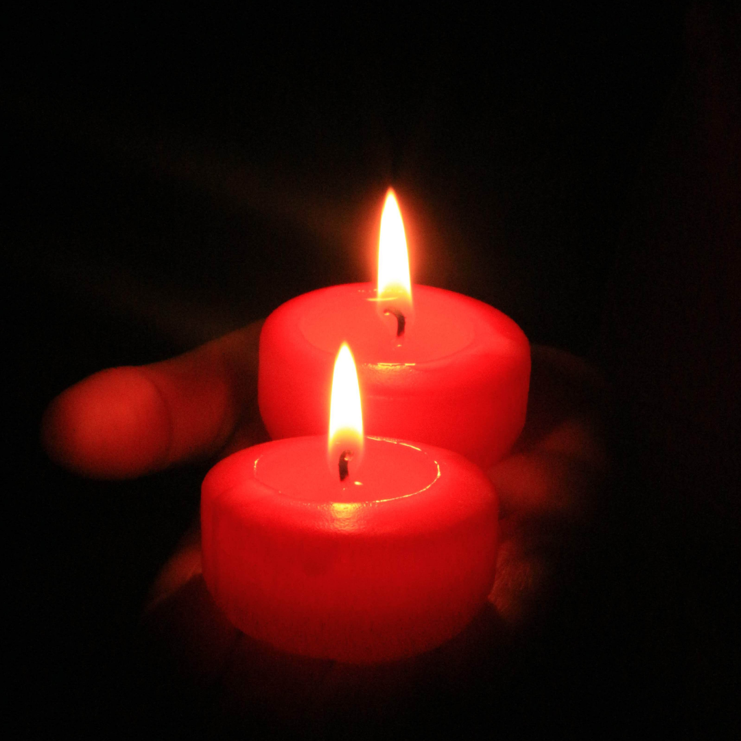 Candles held in hand