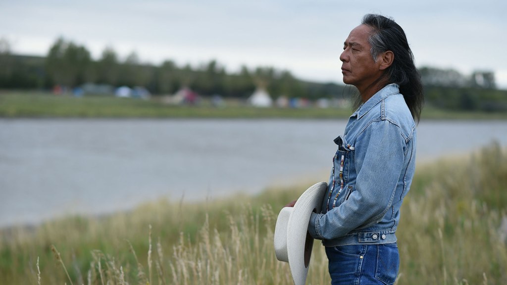 Ron His Horse Is Thunder, a spokesperson for the Standing Rock Sioux Tribe, looks over a river during Dakota Access pipeline protests in 2016.Robyn Beck / AFP / Getty Images