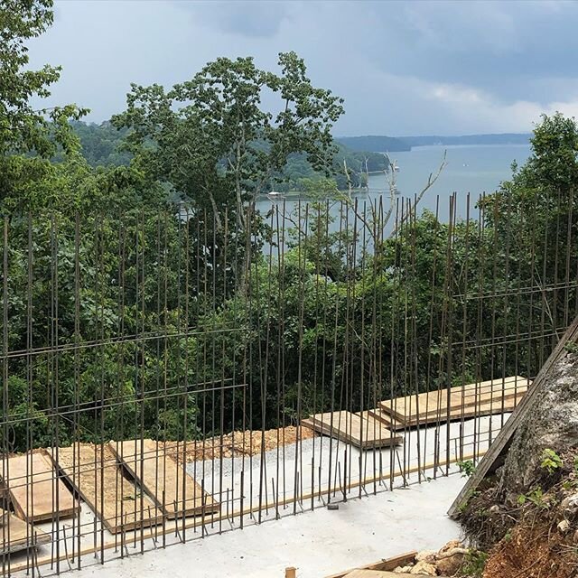 The beginning stages of an enormous retaining wall we are building to level up this amazing view lot for some of our custom clients. #watershollandbuilders #watersholland #retainingwall #concretewall #chattanoogarealestate #customhome