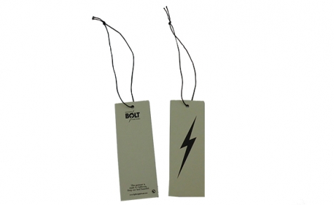 Cream color hang tag with black elastic