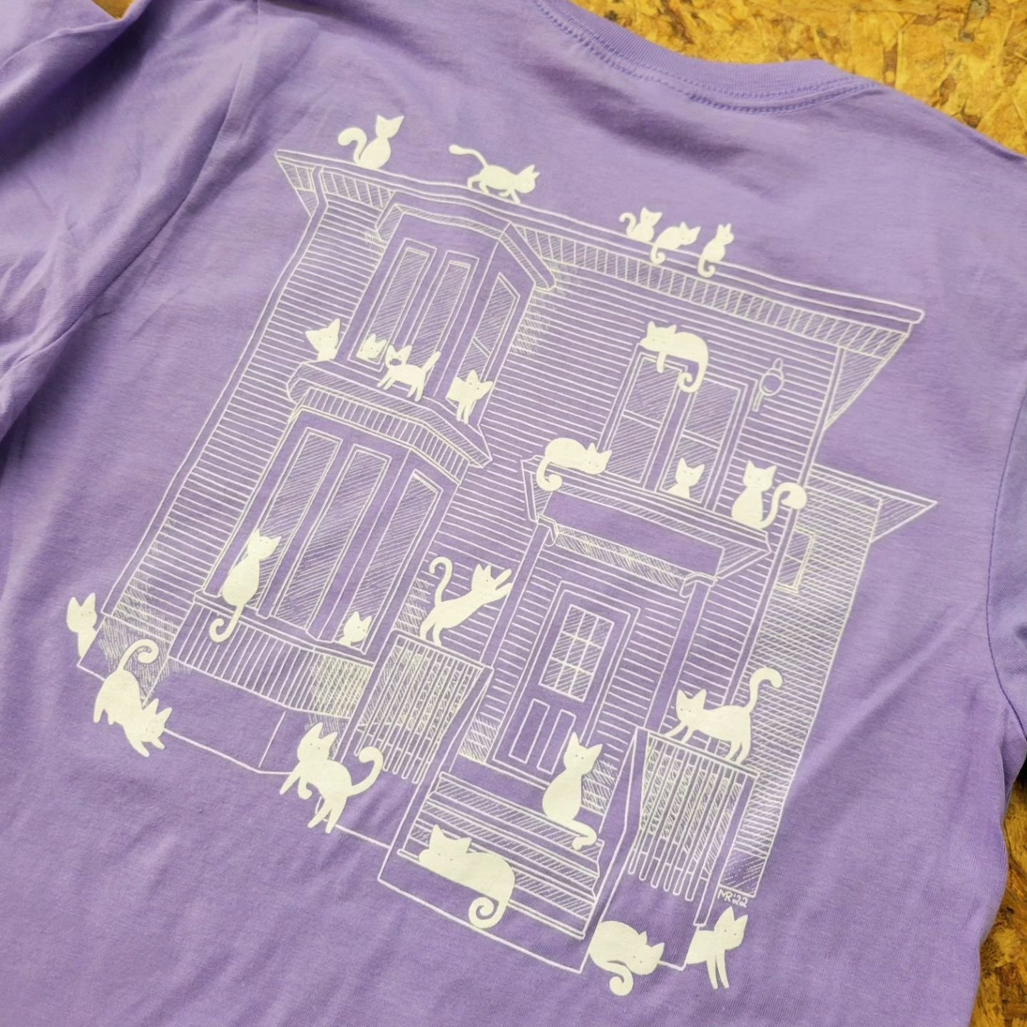 Shirts for @constellationcatcafe on Dark lavender, Bella Canvas. Turned out great with fantastic artwork.