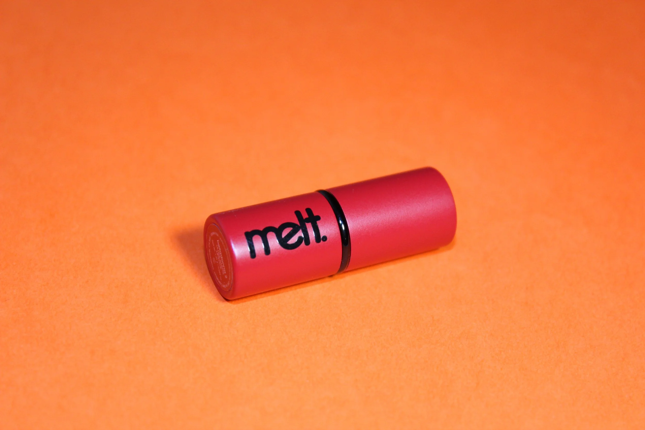 Single red on orange.jpg