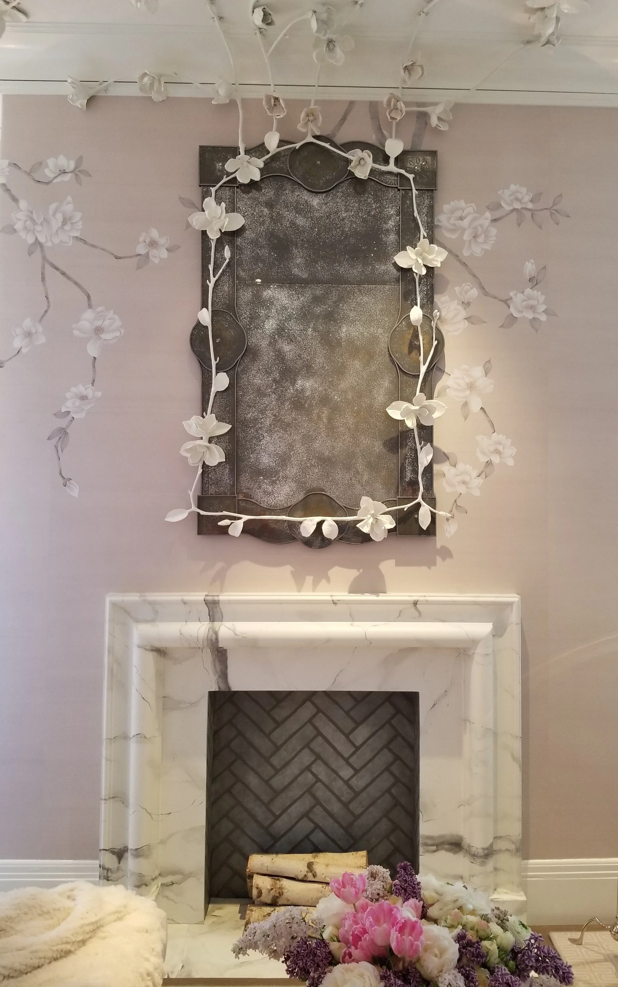 Dina Bandman’s ultra-feminine master bedroom was a highlight. The hand-made flowers continue on up on to the ceiling. And the gorgeous marble fireplace is actually painted—but, you would never know!