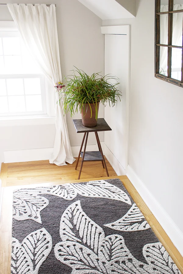 taupe botanical leaf rug bright hallway landing