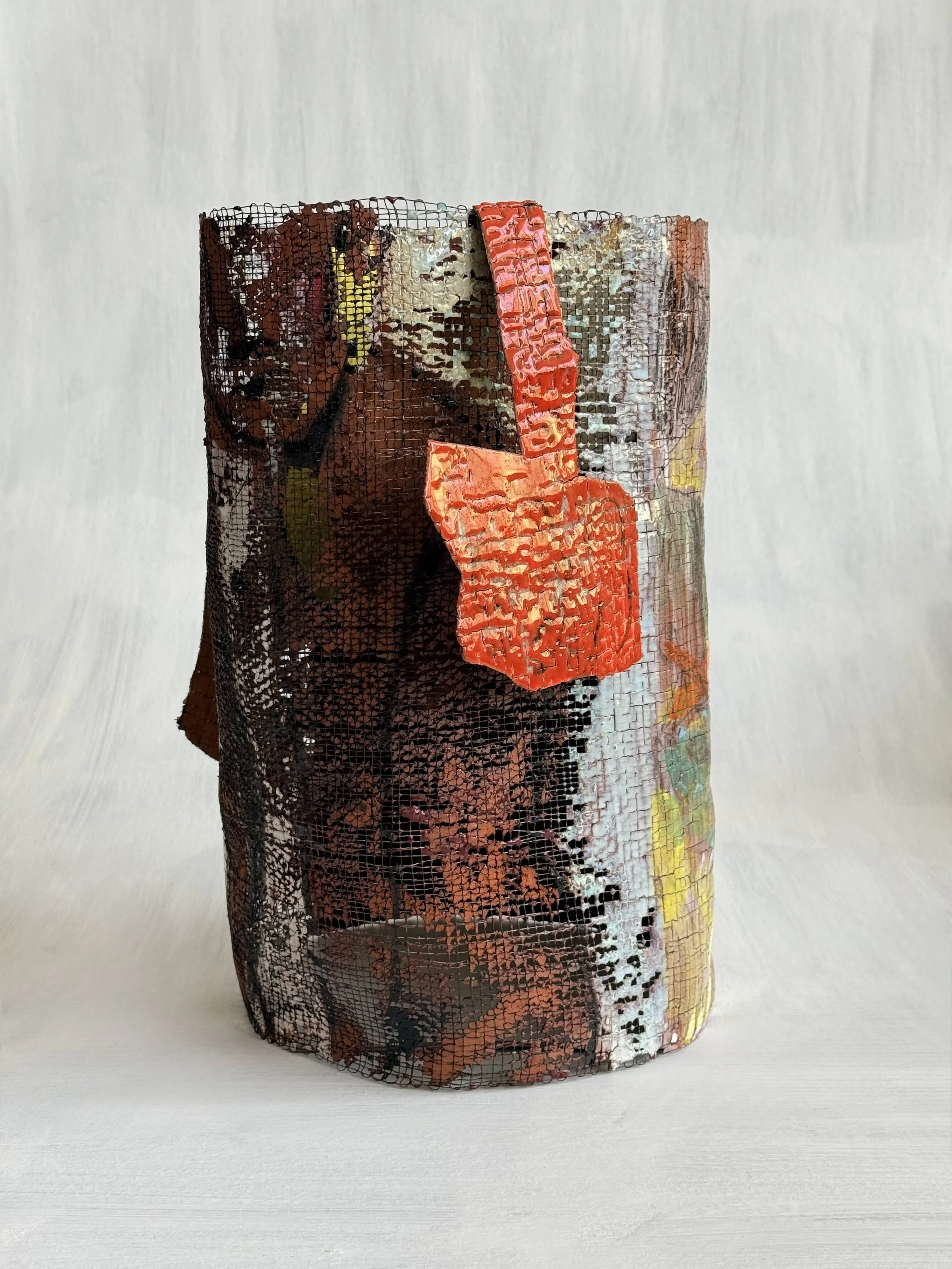 Matissean Garden;
2024;
ceramic, handwoven wire, glaze;
13 (h) x 9 (w) x 10 (d) inches;
front view