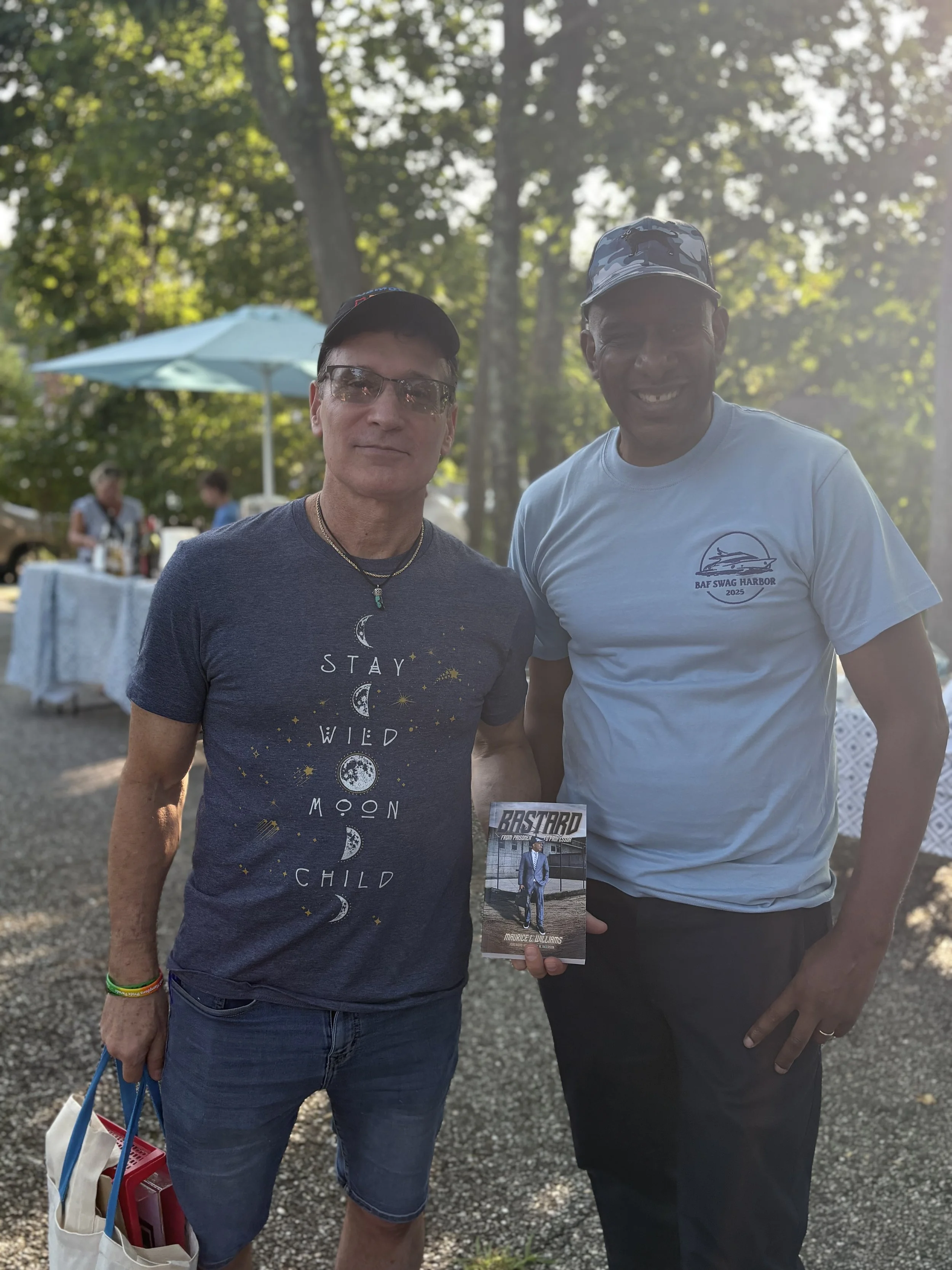 Moe and with book supporter.jpg