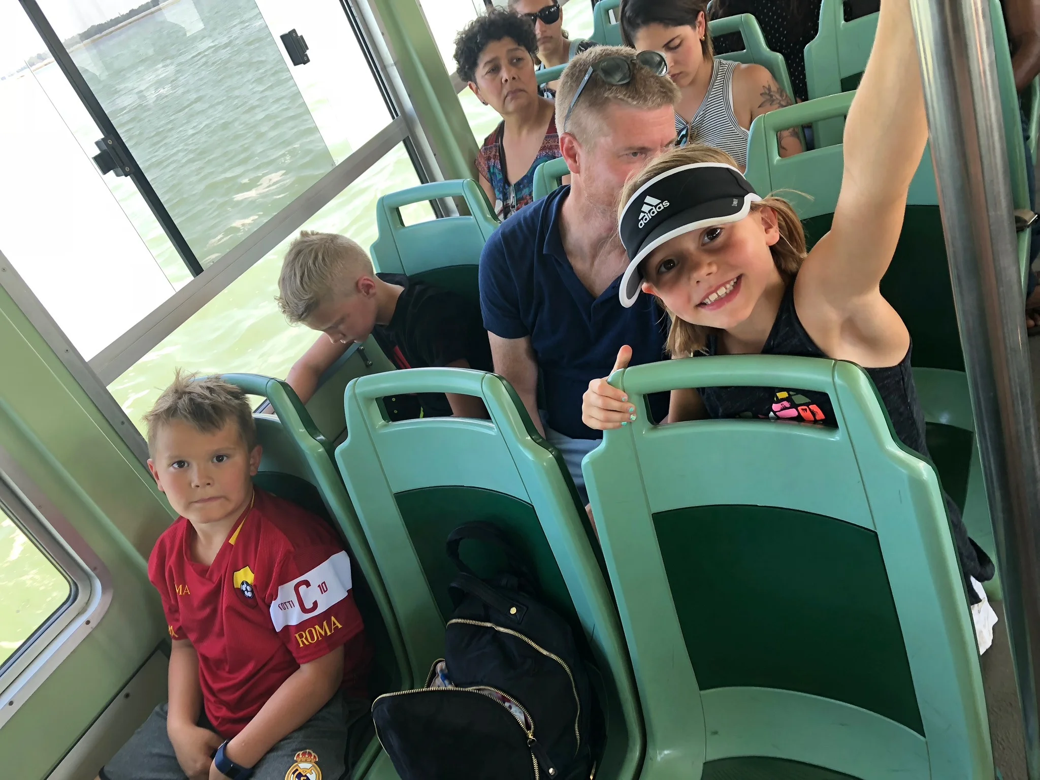 They actually look pretty happy here but looks can be deceiving-on the too long 5 hour boat tour