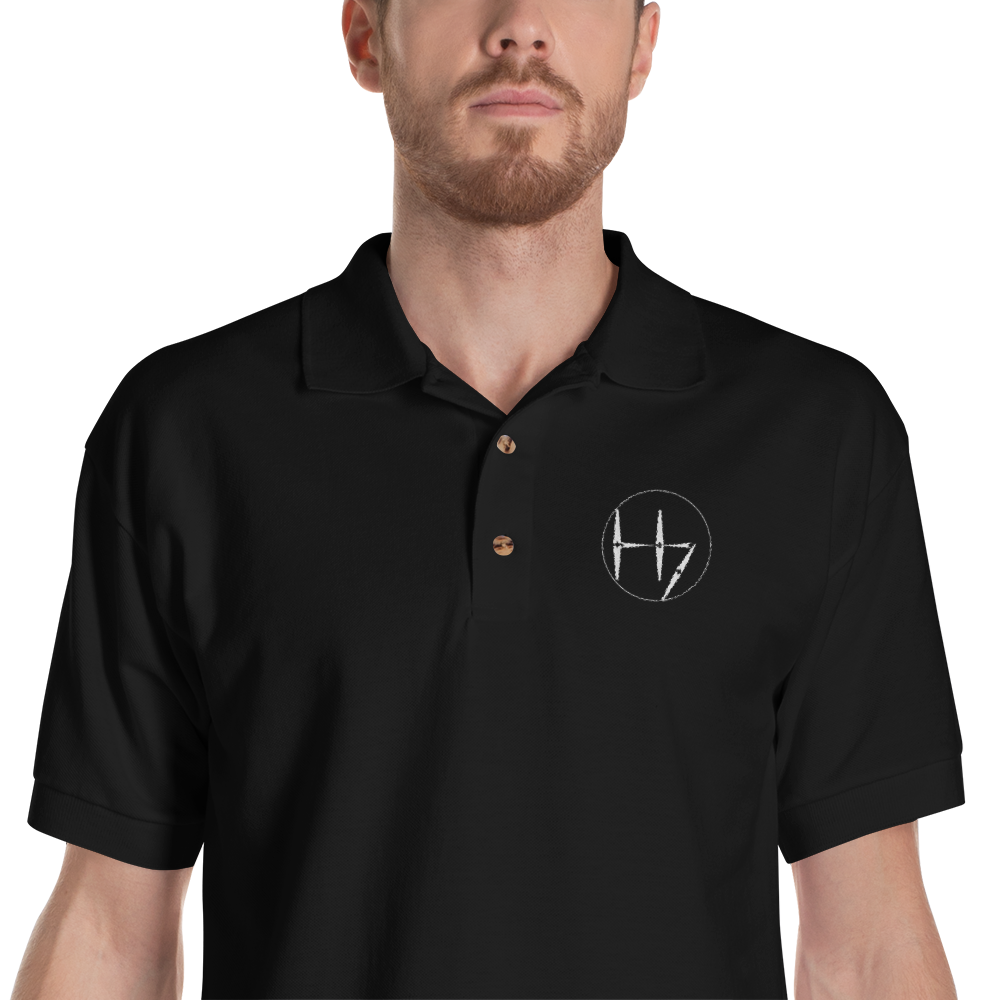 Crest-of-The-Heptad---Black_file_embroidery_apparel_front_mockup_Zoomed-in_Mens_Black.png