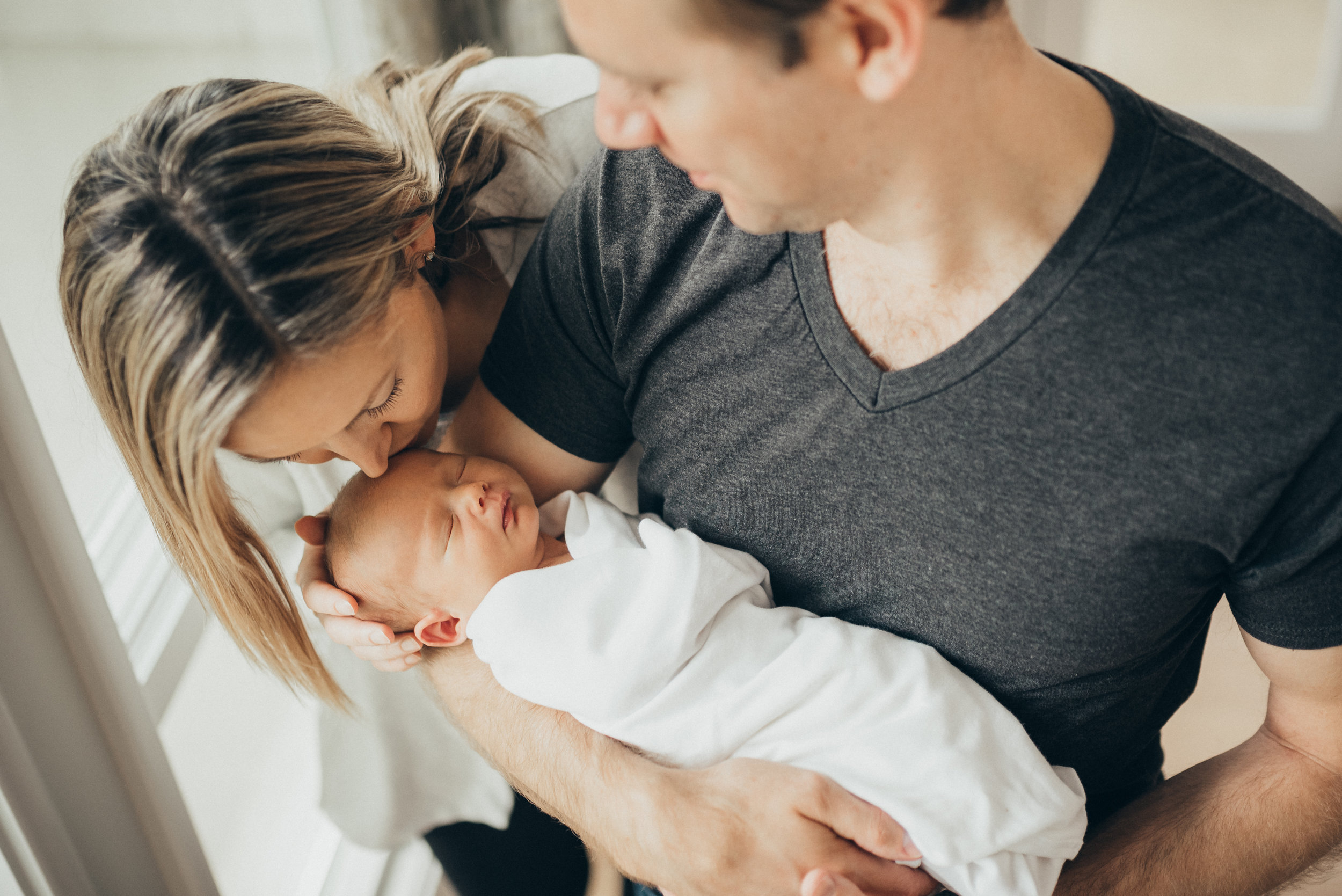 parents-and-newborn-boy-in-home1.jpg