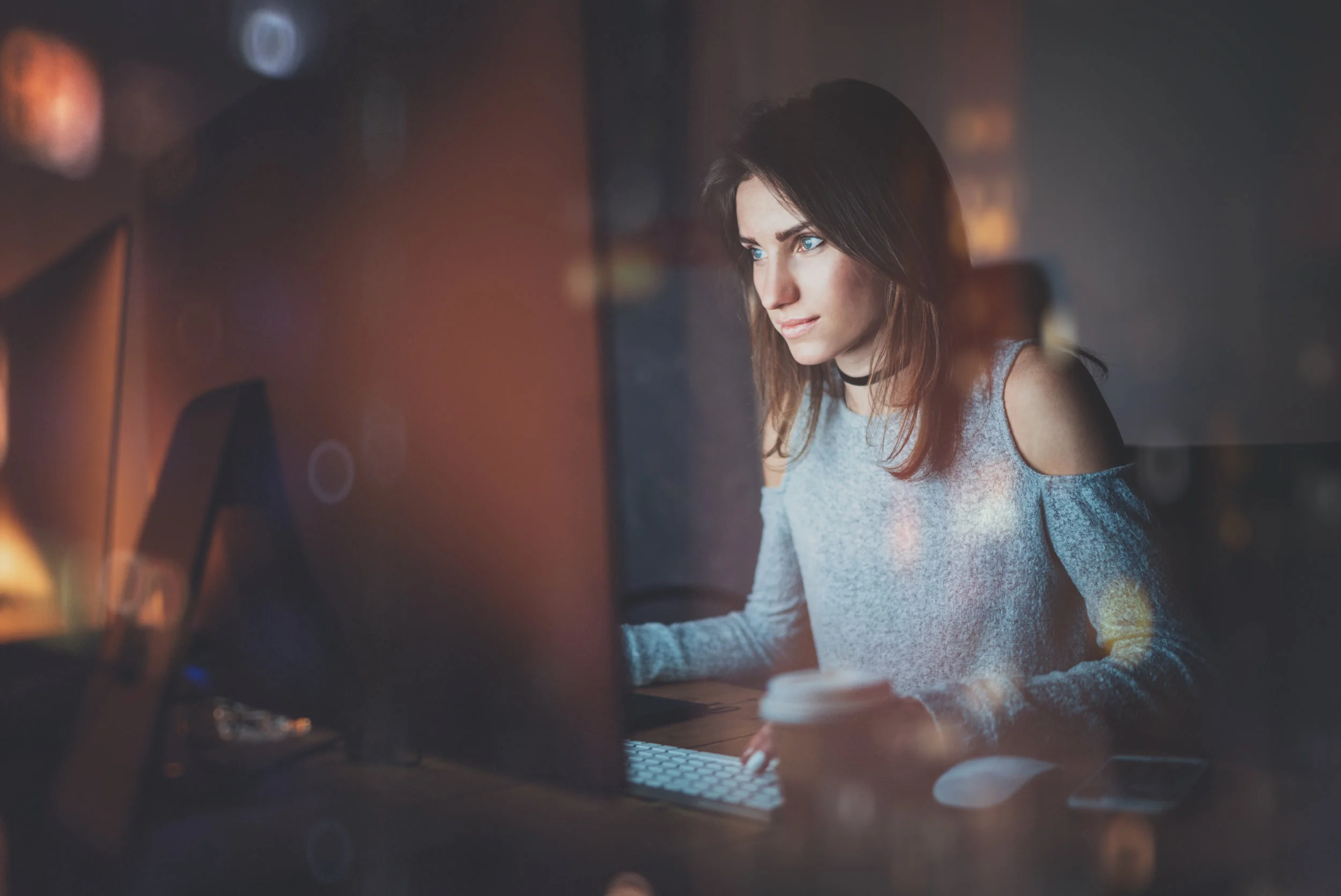 woman working on computer at night.jpg