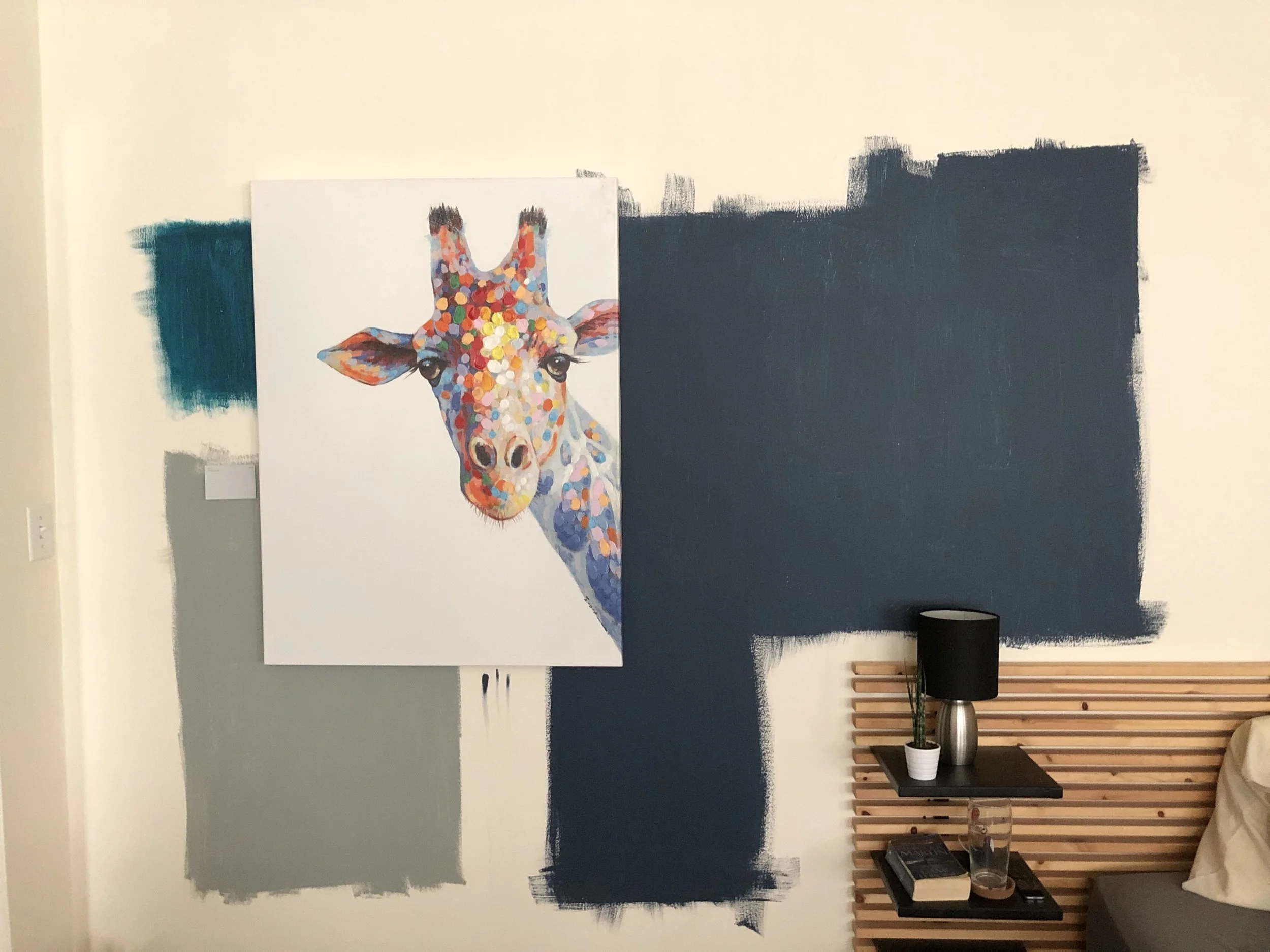 A client put multiple samples on the wall to make a more informed decision about what his final color choice would be.
