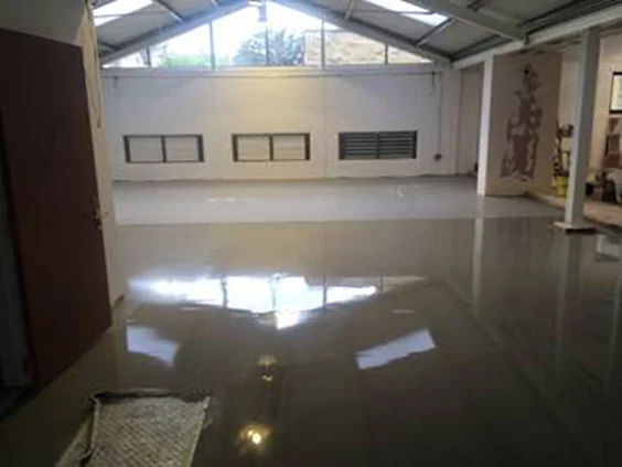The weights gym floor being levelled in stages.