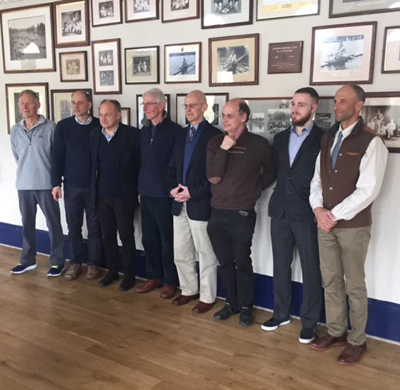 Members of MK's family stand in front of the photo following its unveiling.