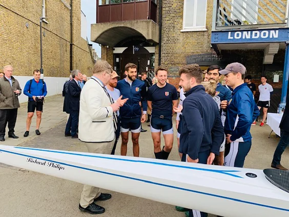 Richard talks to members of the current squad.