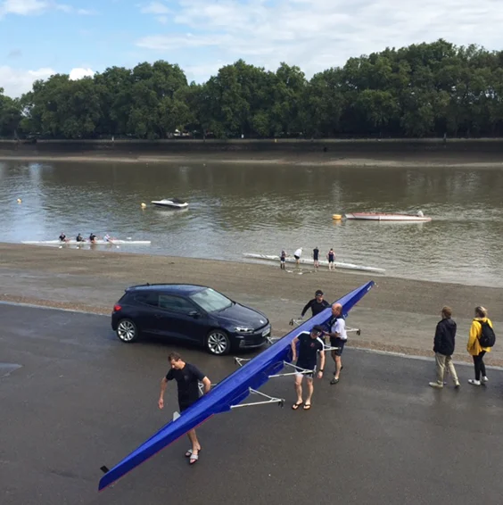 Three Irregulars' quads come off the water after their Sunday morning outing. A fourth four and a double scull were out that morning as well.