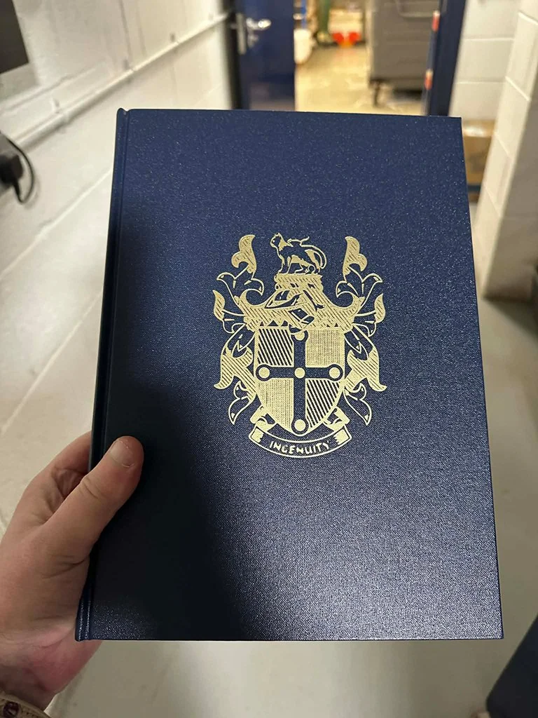 The art of bookmaking: Crafting a family crest