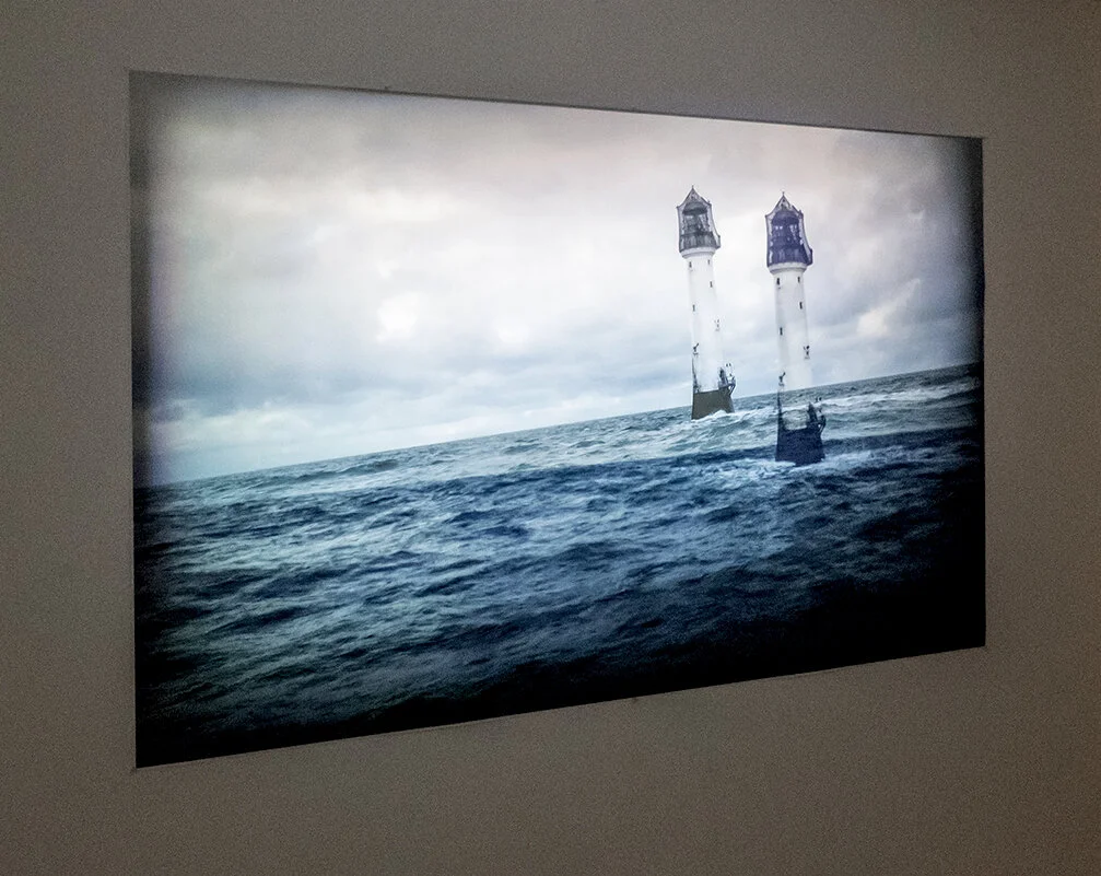 Bell Rock   2019  Inkjet print on paper, 205cm x 150cm and single channel video projection.  Installation view at PhotoAccess gallery Canberra, July 2019  Installation photograph - Kate Matthews