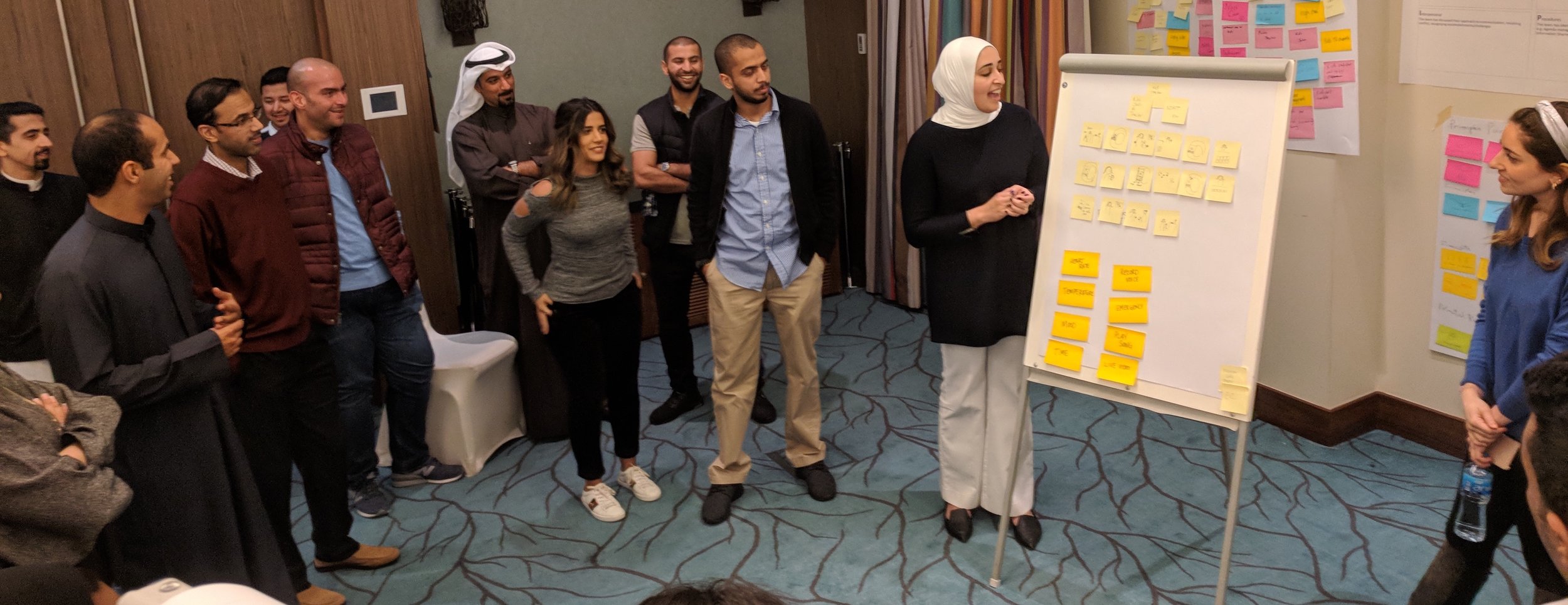 A team presents its initial direction to the other participants