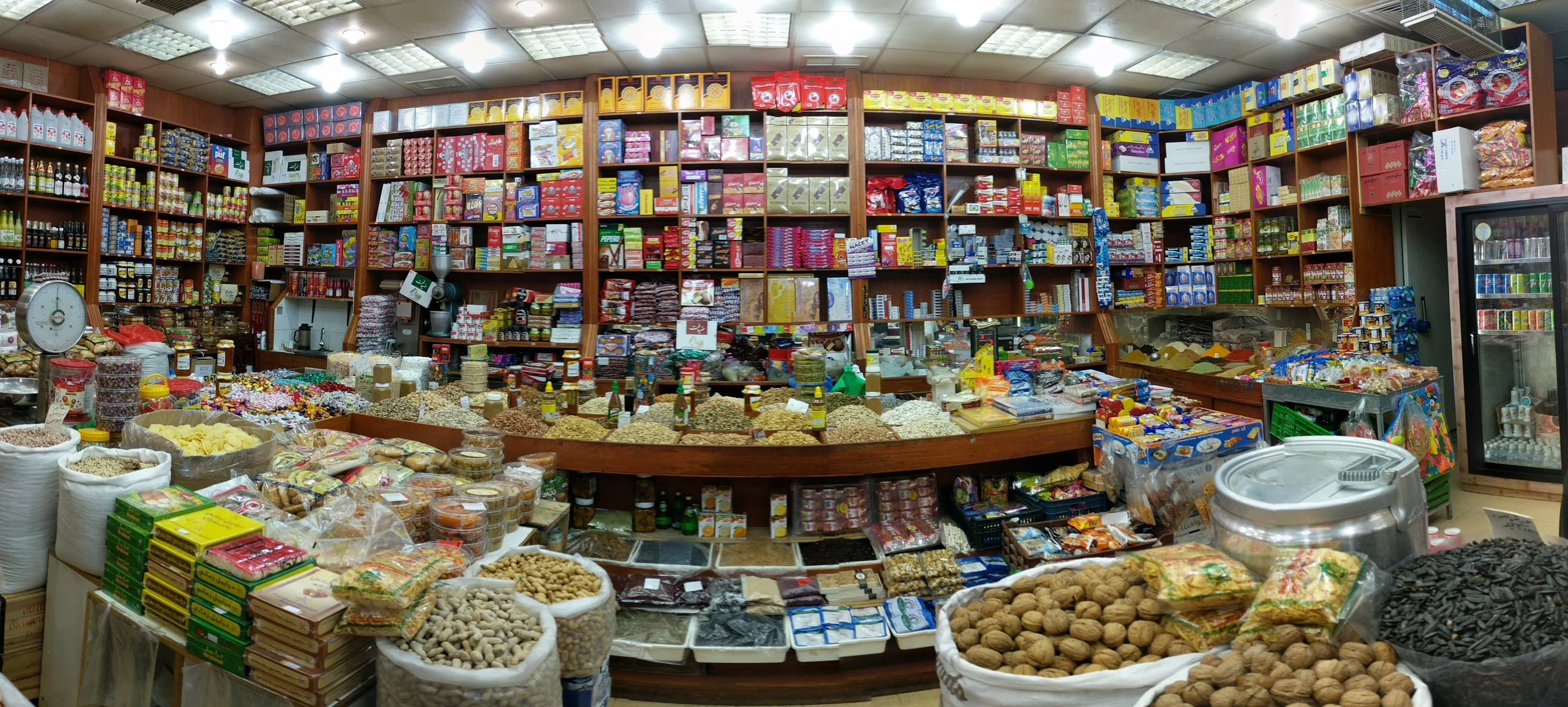 A typical souk stall selling nuts, dates, and packaged goods