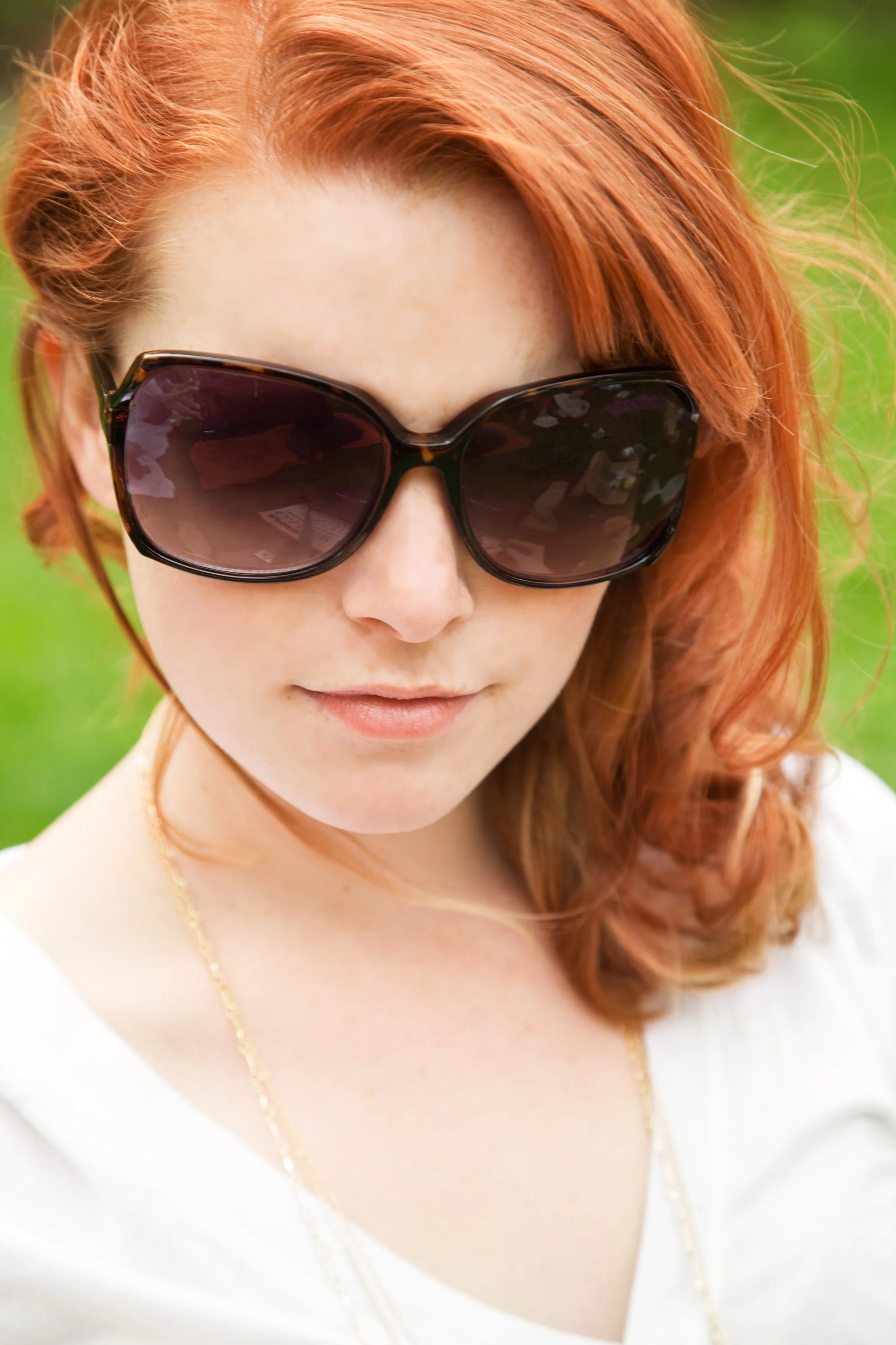Color and exposure correction, reflection reduction, vibrancy, skin smoothing.