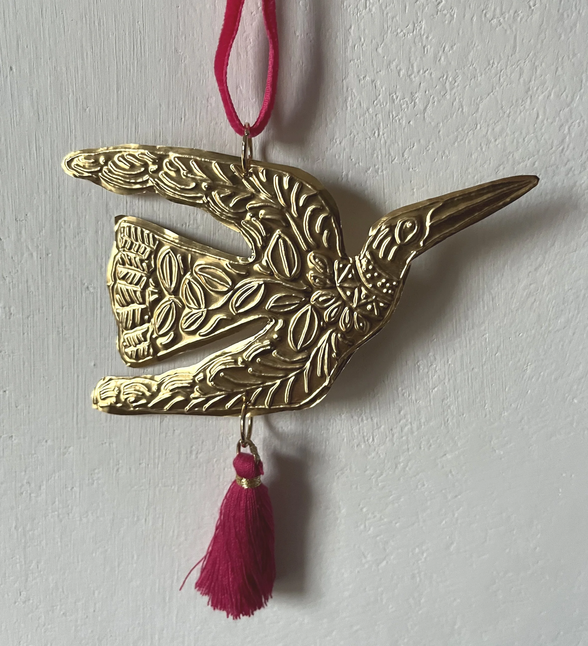 Gold folk bird tassel dec closer.jpg