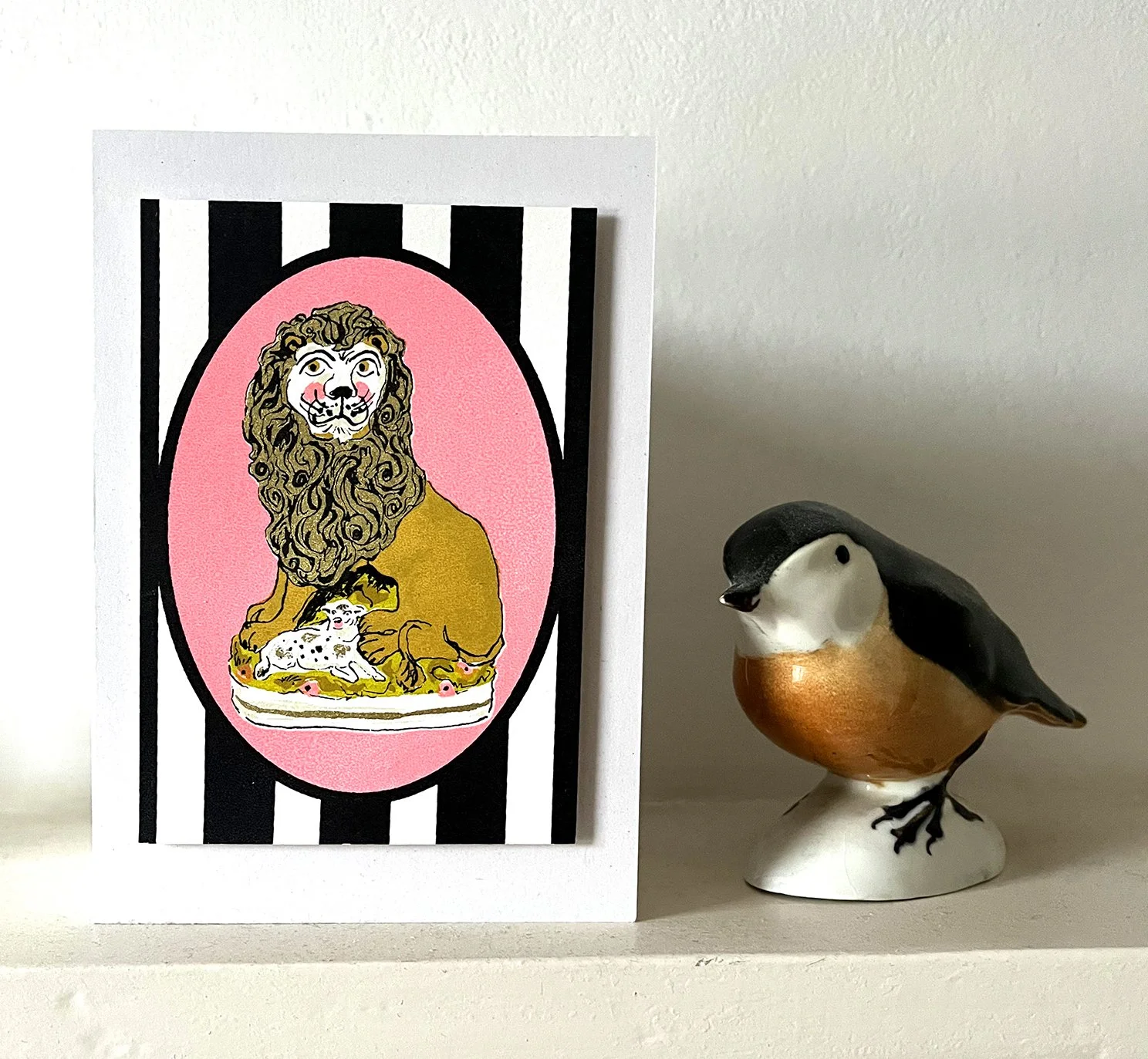 Staff Lion Card on shelf.jpg