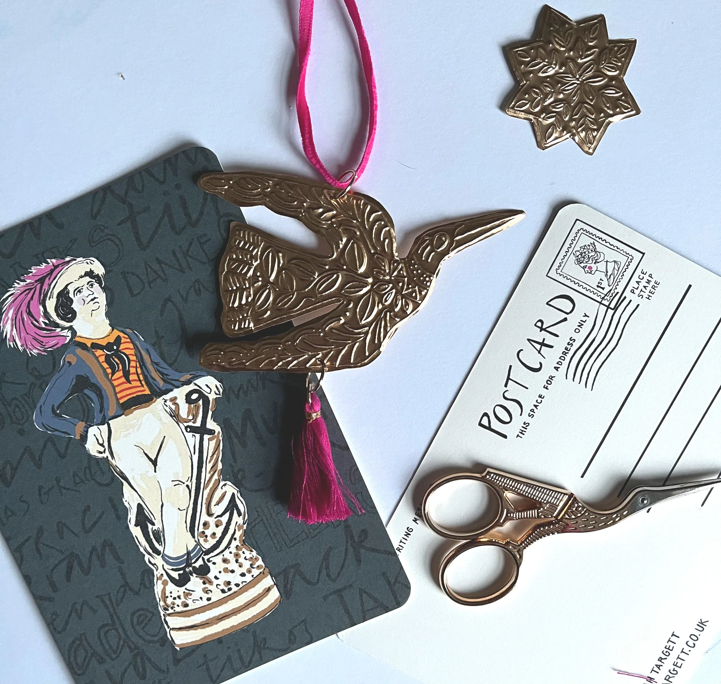 Gold folk bird tassel dec flatlay.jpg (Copy)