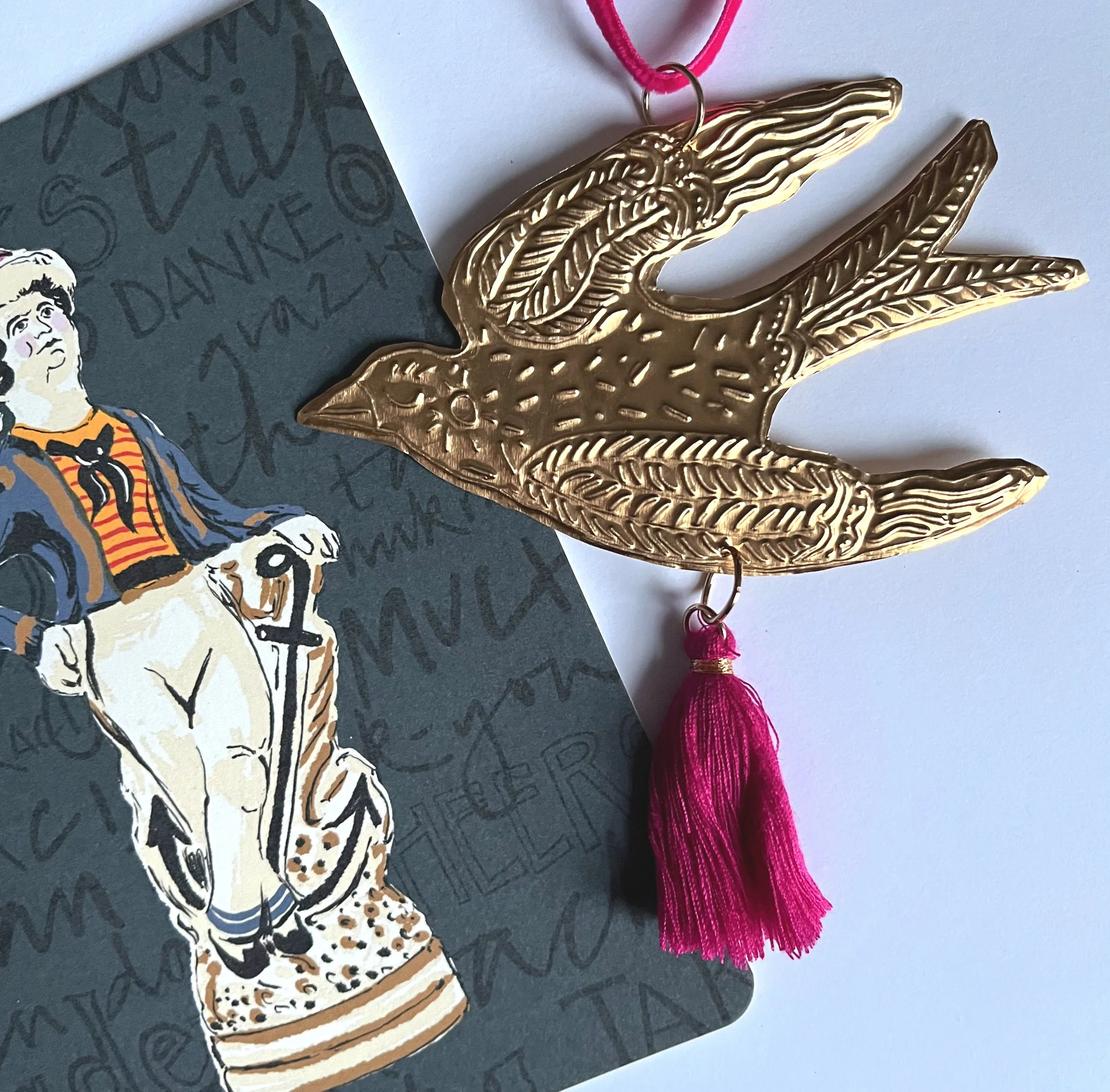 Gold bird tassel dec flatlay.jpg