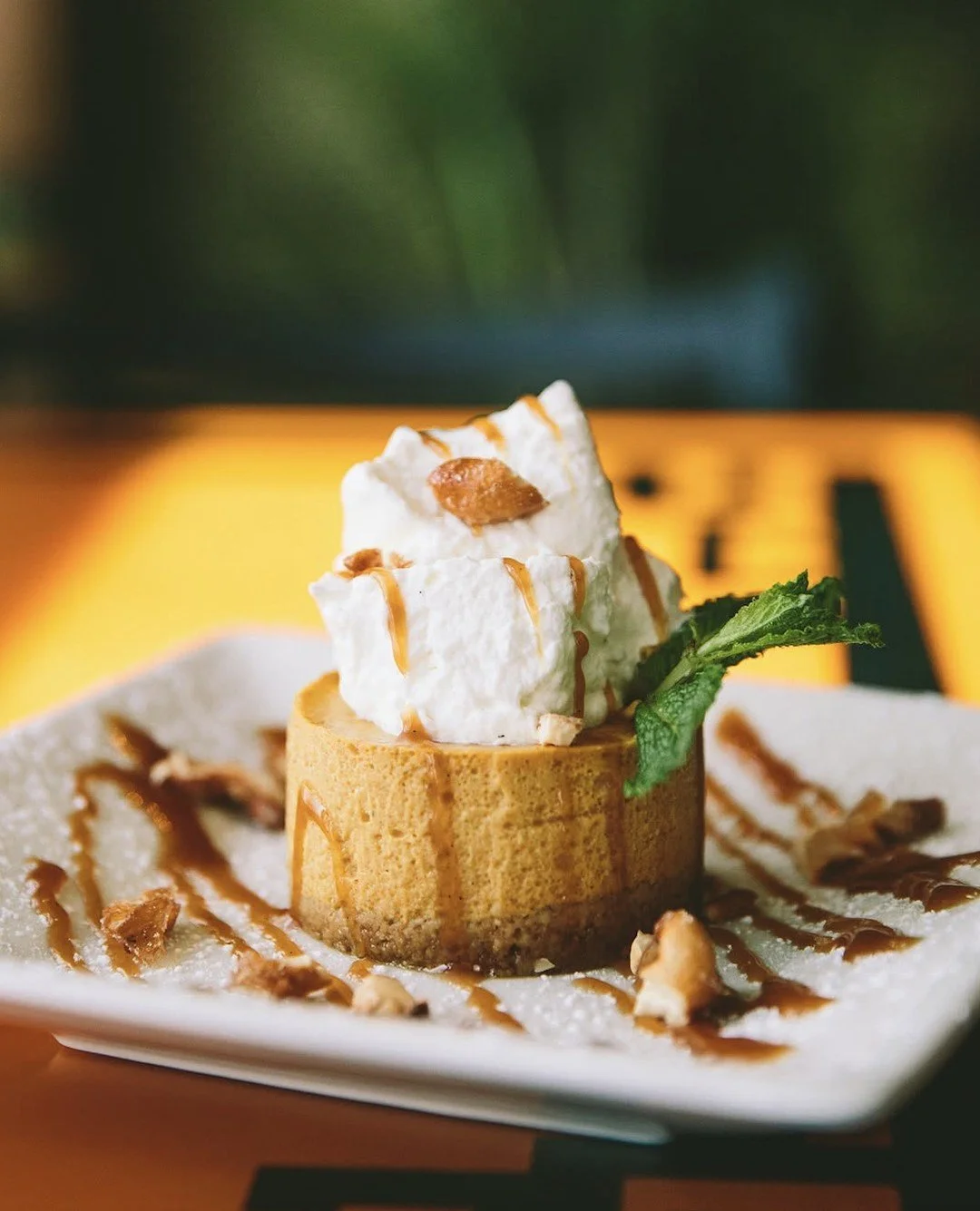 It's the season for all things pumpkin&mdash;and @bigbowlbuzz's Pumpkin Cheesecake is the ultimate indulgence! 🎃 Rich, creamy and finished with candied cashews, caramel sauce, and whipped cream, it's a decadent way to finish any meal! ⁠