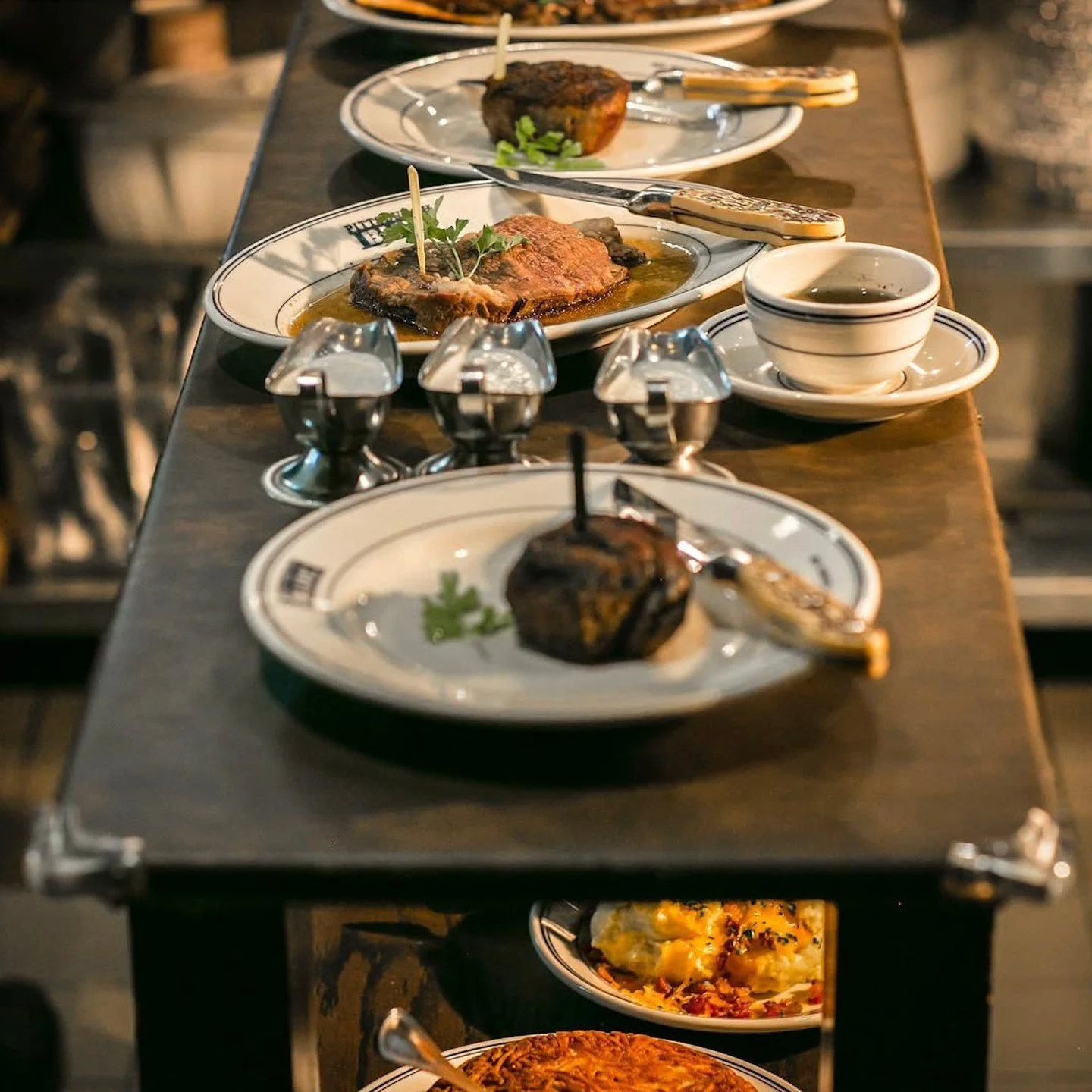 Nothing says the holiday season quite like a cozy night in at @pittsburghblueedina! 🍸 Escape the winter chill and settle in for the evening with their delicious lineup of steaks, seafood and craft cocktails. Call (952) 567-2700 to reserve your table