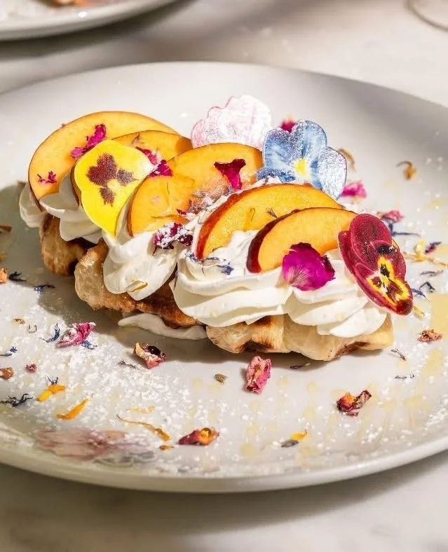 A beautiful (and delicious!) break between blooms. 🌸 While exploring our @fleursdevilles FLORA showcase, stop by one of our Galleria restaurants and enjoy curated, limited-time menus featuring fresh spring dishes and floral-inspired sips. Tap the li