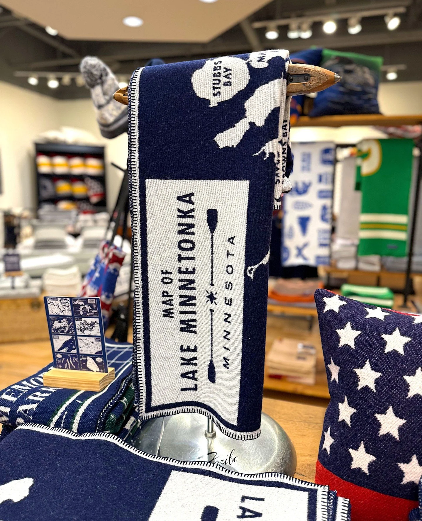 Sunnier days on the lake are calling. 🌊 We're gearing up for cabin season with @faribaultmill's timeless collection of lake map throw blankets and pillows. From Lake Minnetonka to the North Shore, and every beloved lake in between, each wool piece a