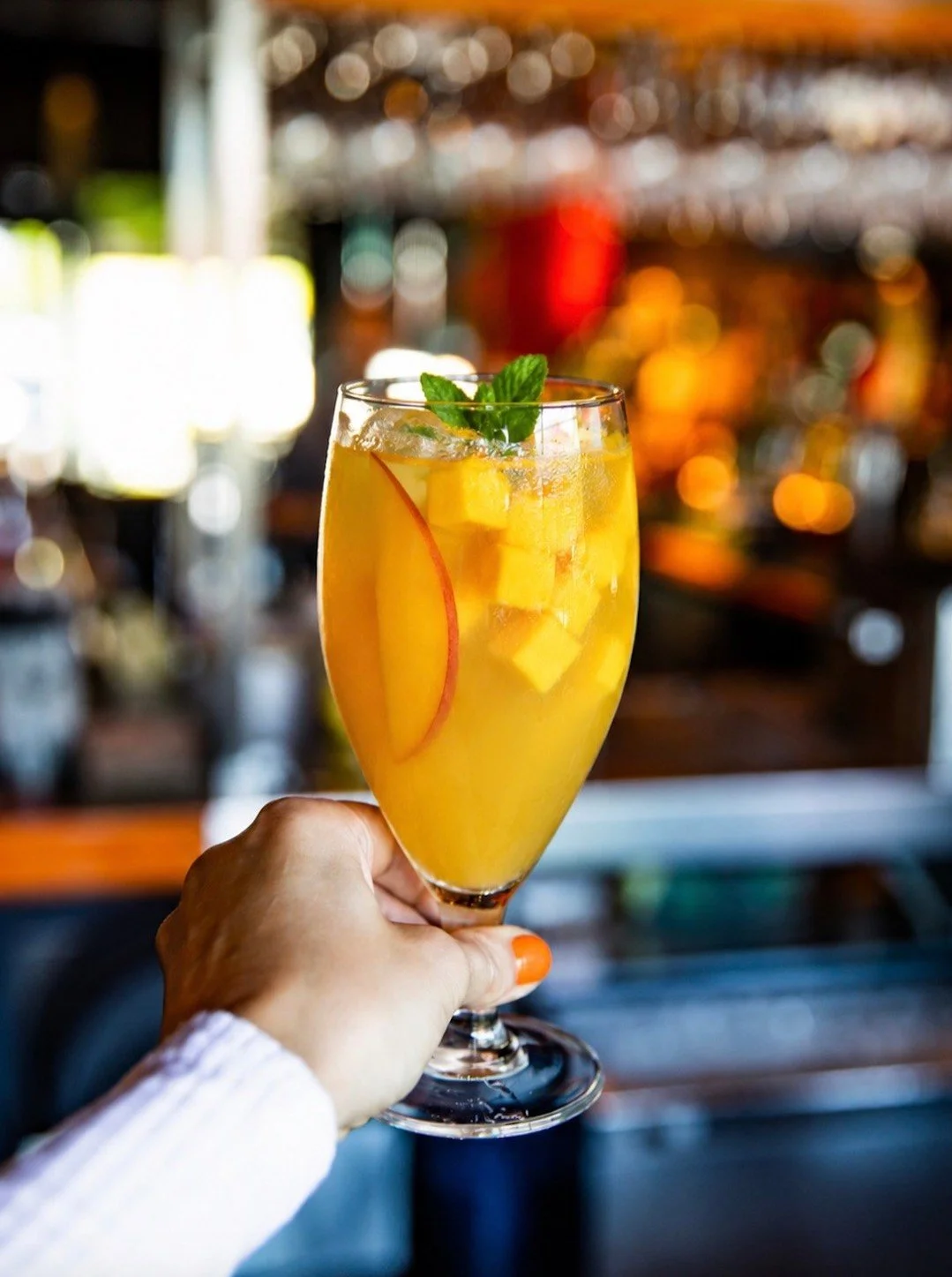 A taste of summer served two delicious ways! 🥭 Cool off from the heat with @bigbowlbuzz's Mango Sangria, then treat yourself to their seasonal Mango Cheesecake for the perfect (and oh-so sweet!) finish. Two mouth-watering reasons to pull up a seat a
