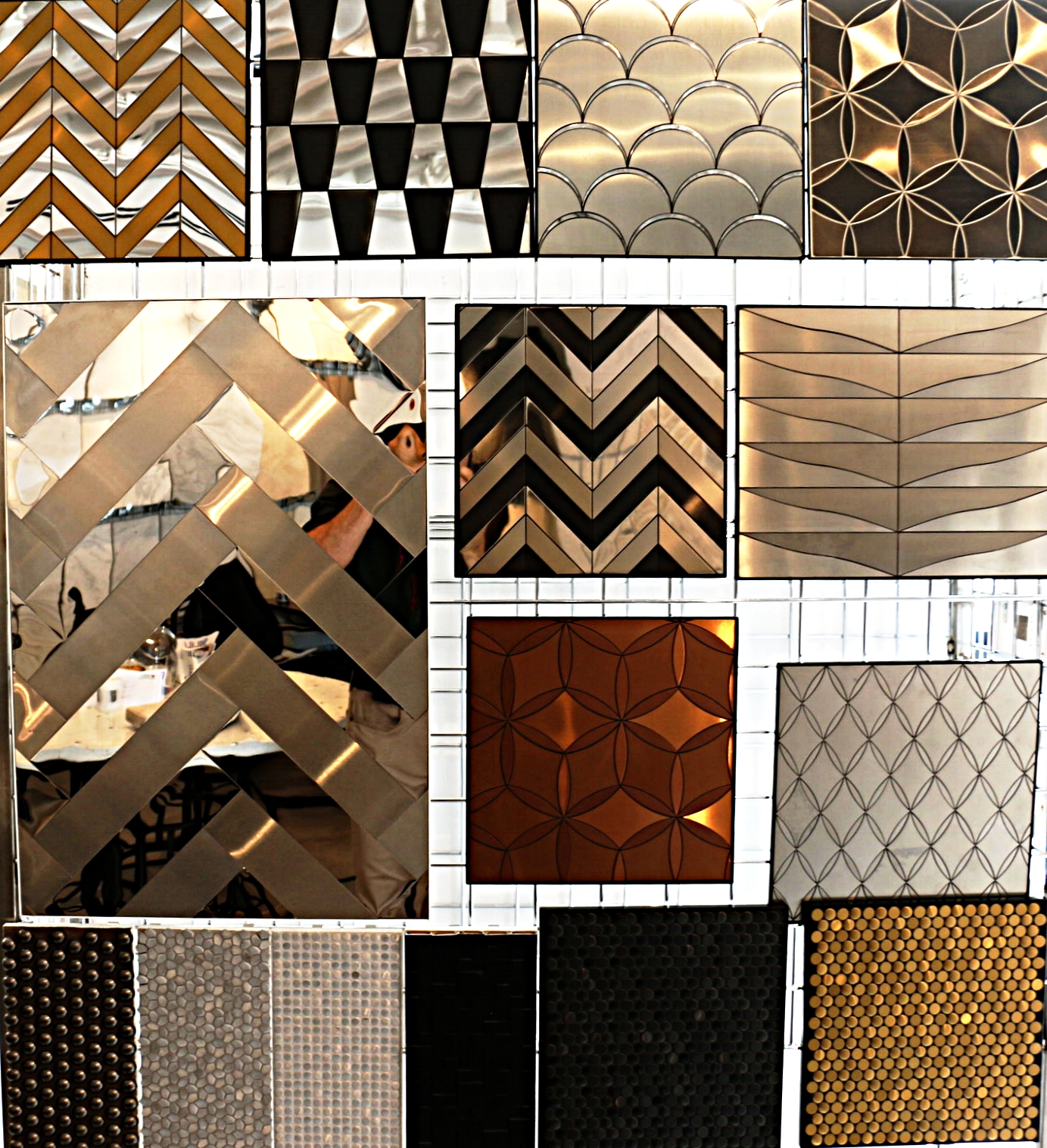 Metal tiles available in shiny and brushed finshes. Numerous patterns to choose from.