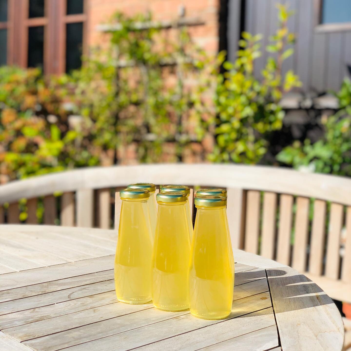 Elderflower cordial all bottled up ready for next weeks lime &amp; elderflower doughnut filling 😋Picked from the garden and bottled in the cutest 250ml bottles, which are for sale at the farm gate! Head to the link in bio to book a slot for next wee