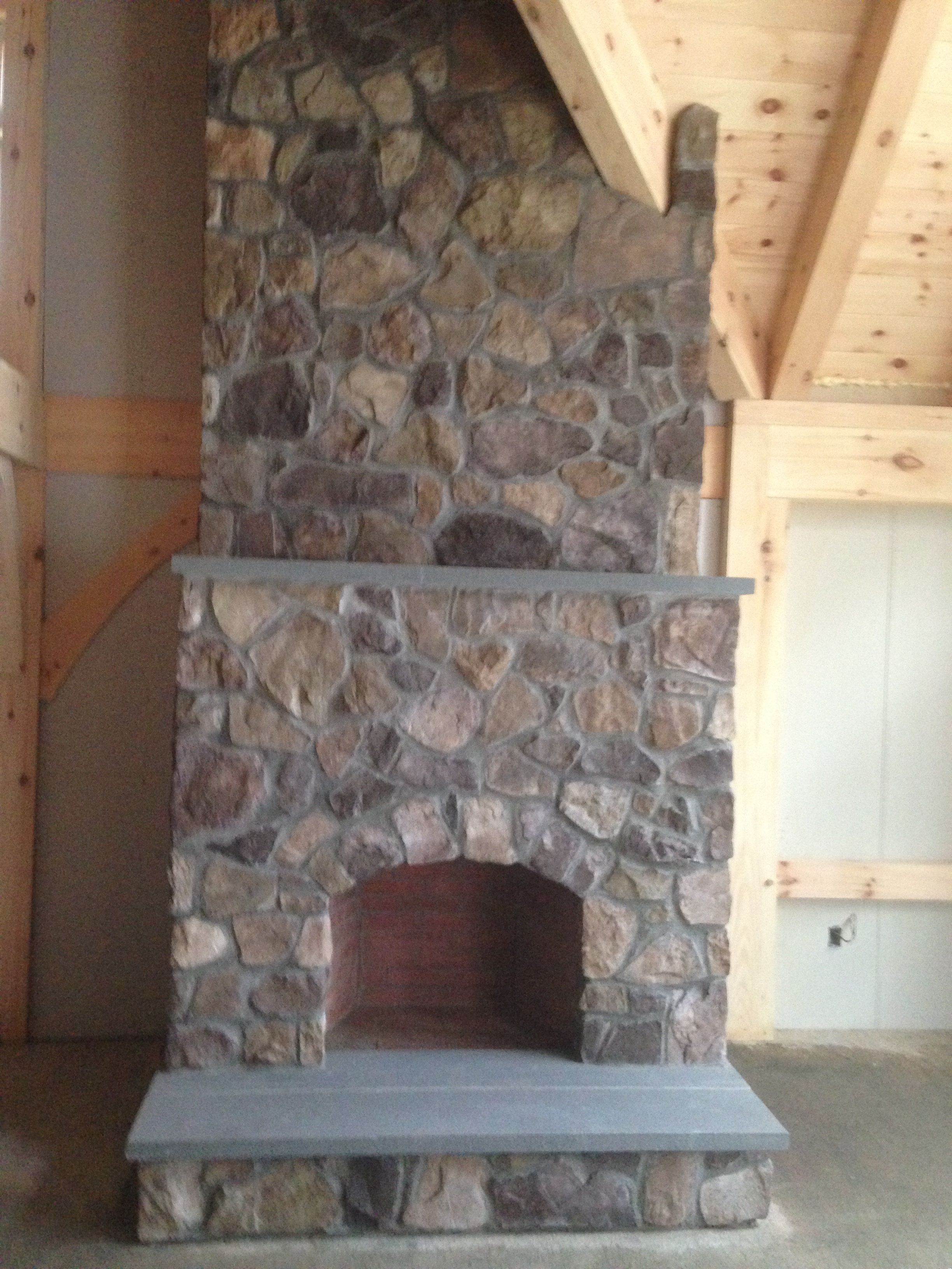 CULTURED STONE FIREPLACE.JPG