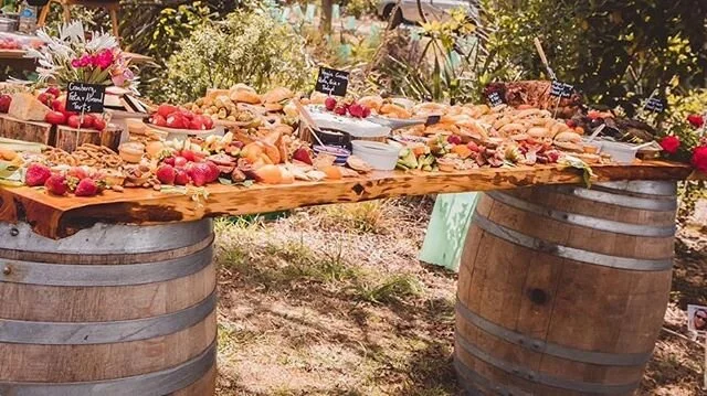 Our large slab loaded up with food. How delicious 🍓🍇 @oliviaspinkphotography 
@nourishcatering