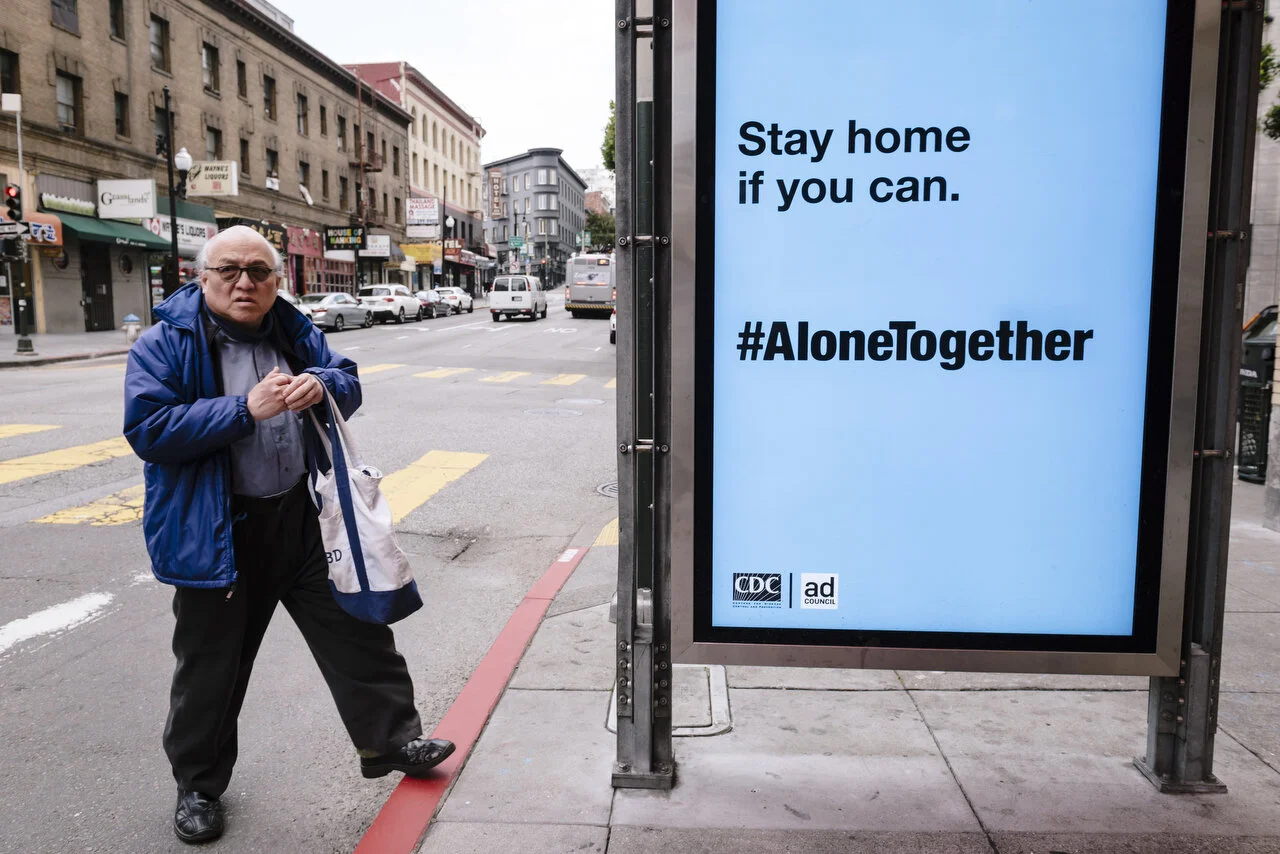  CDC sponsored bus stop signs in San Francisco following a shelter-in-place order made by the mayor, March, 2020,  For Bloomberg. 