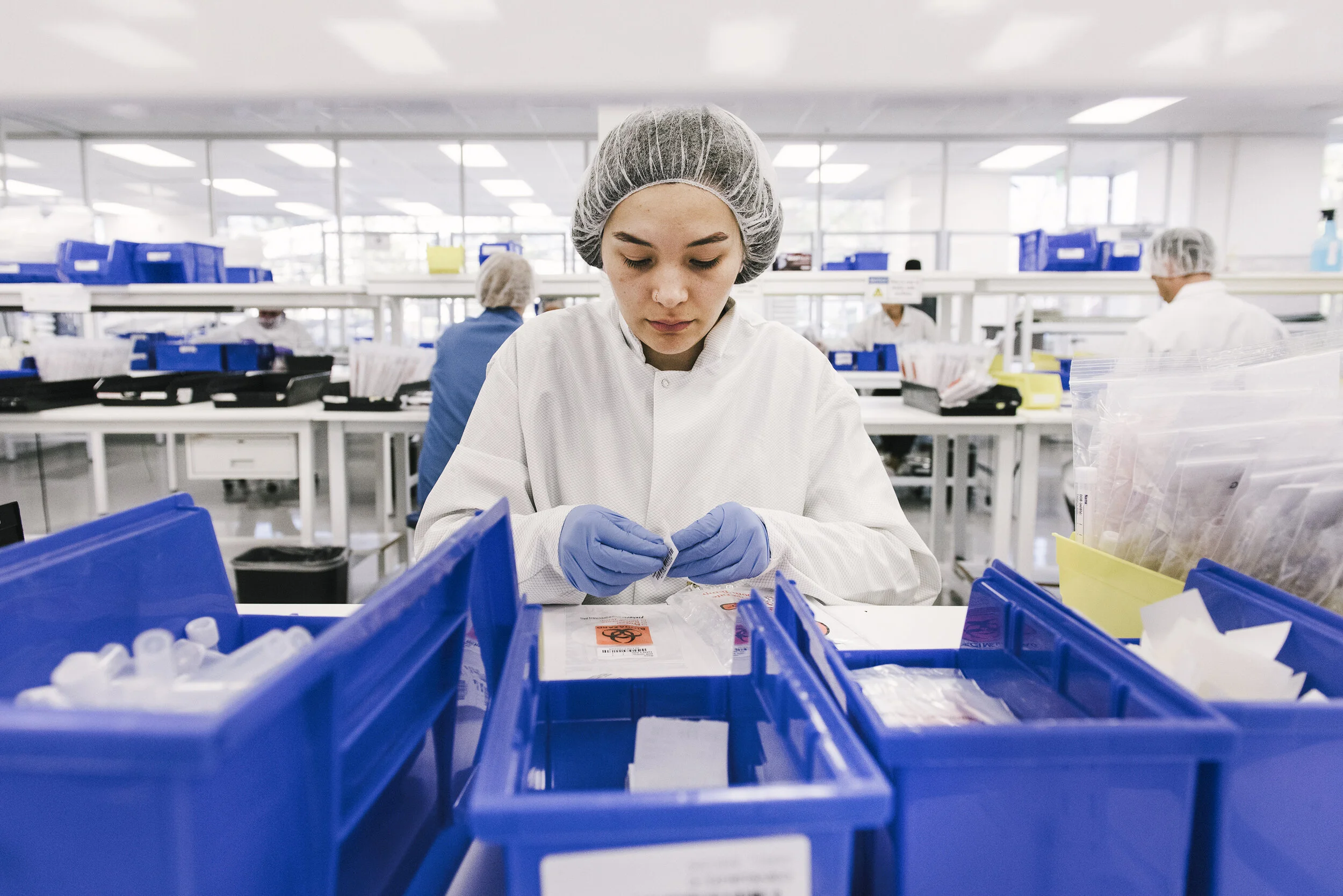  Assembly workers assemble Covid-19 testing kits at Evolve Manufacturing Technologies Inc., which has switched from making other medical equipment to making supplies for clients fighting the novel coronavirus, in Fremont, Calif, on Wednesday, April ,