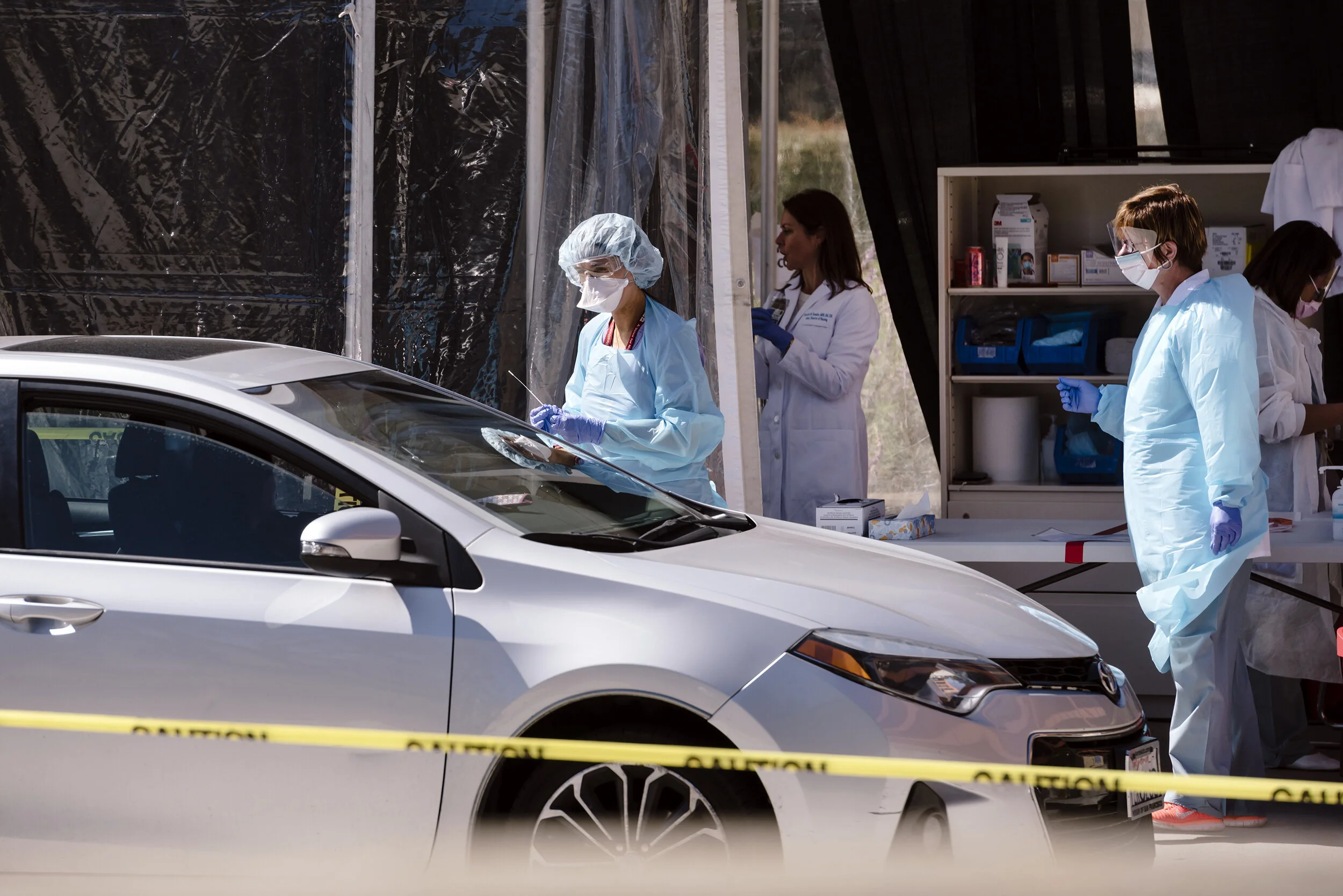  Kaiser clinicians test a patient at a drive-thru COVID-19 testing station on  Kaiser Permanente's French Campus in San Francisco, California, US, on Wednesday, March 12, 2020.  For the Washington Post 